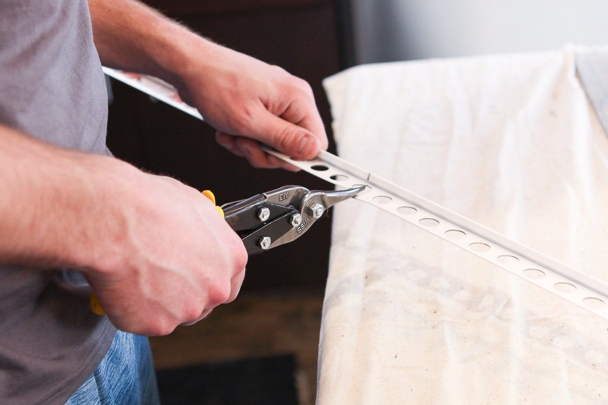 Use tin snips to cut metal schluter