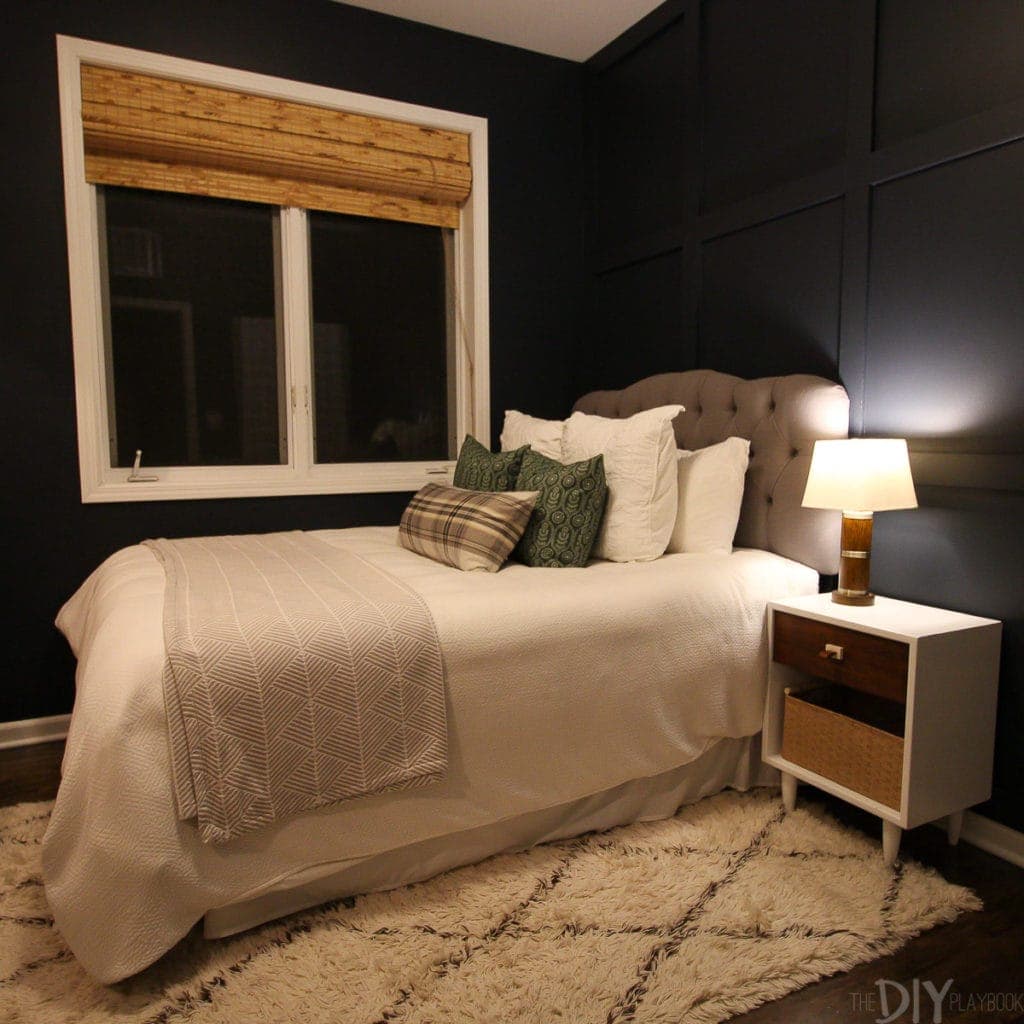 Navy guest bedroom after dark