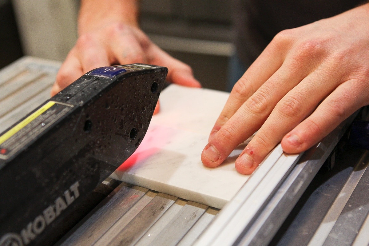 cutting marble subway tile on the wet saw