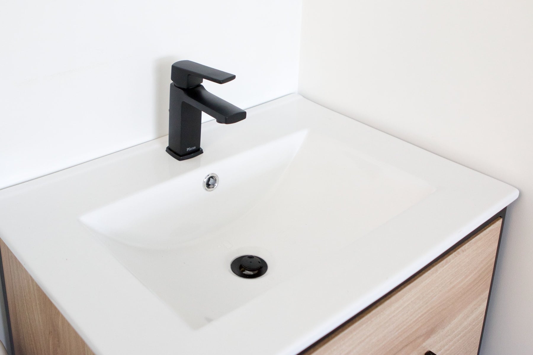 black faucet with black drain