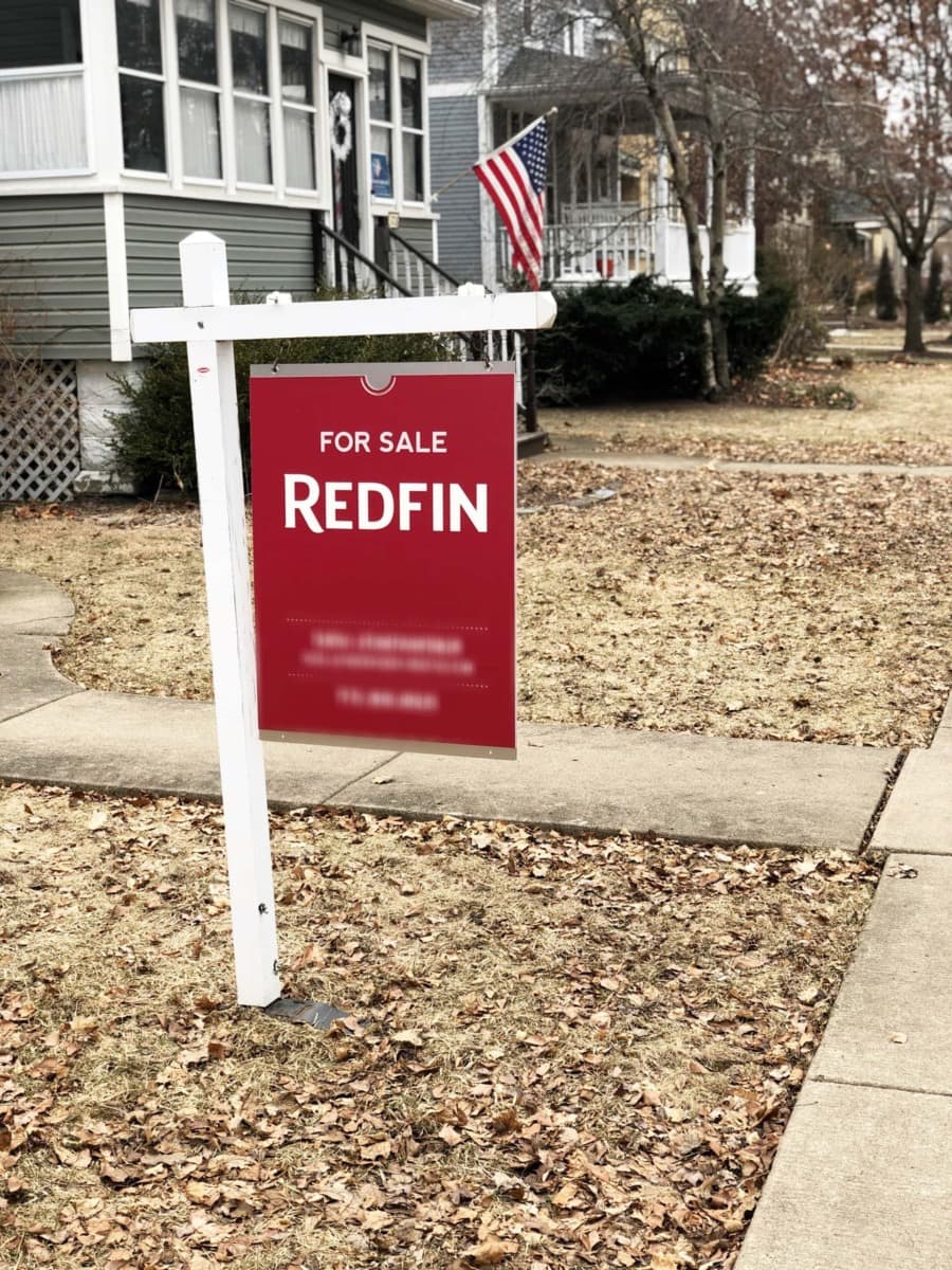 For sale sign when house hunting