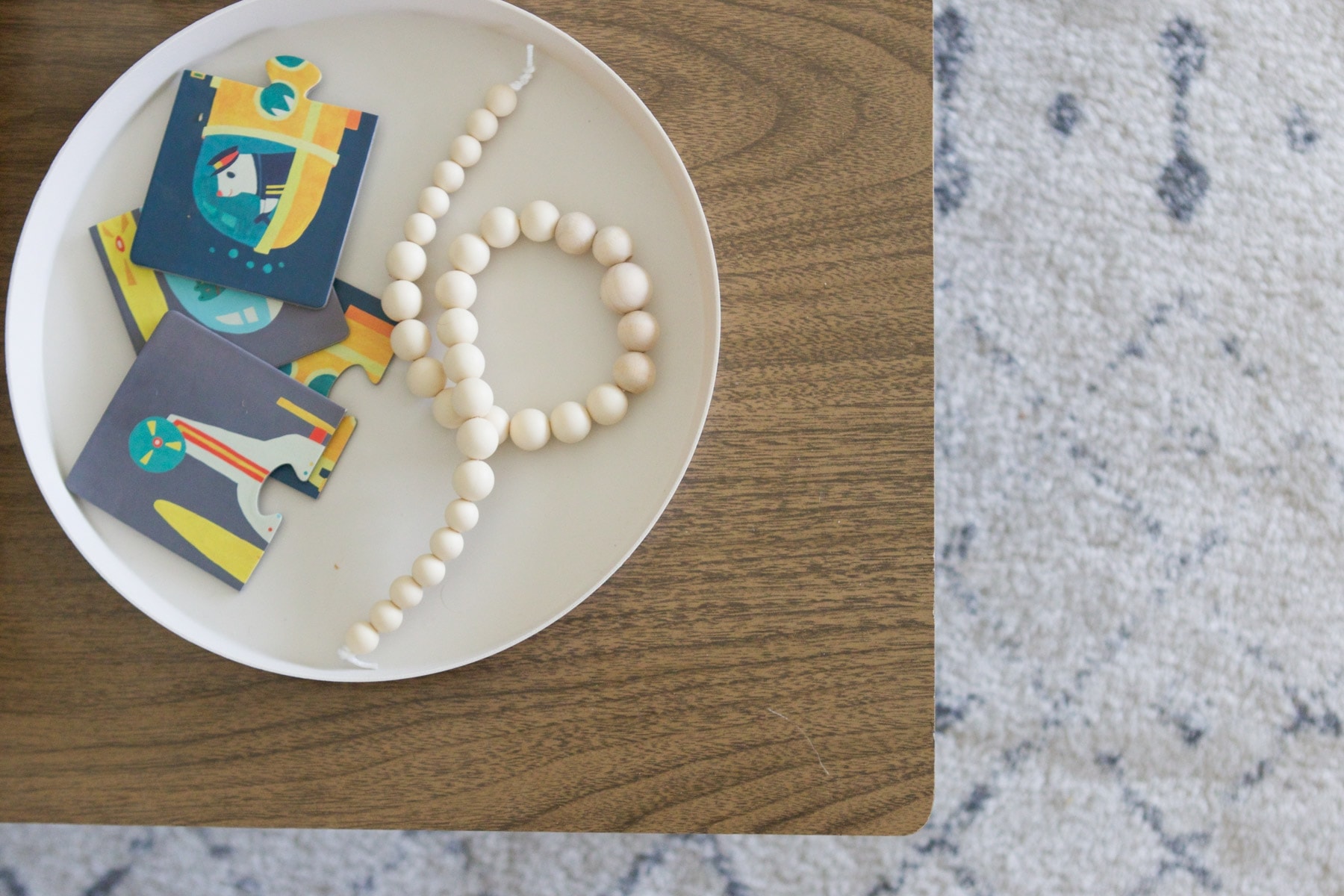 tray for baby toys on styled table