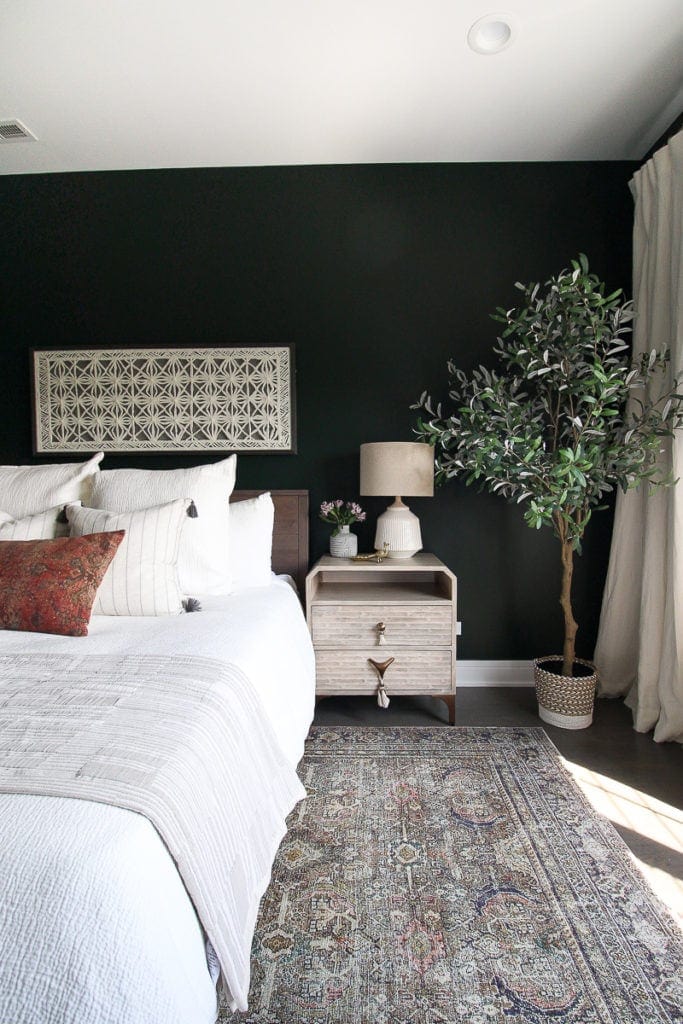 Light wood nightstands in guest bedroom