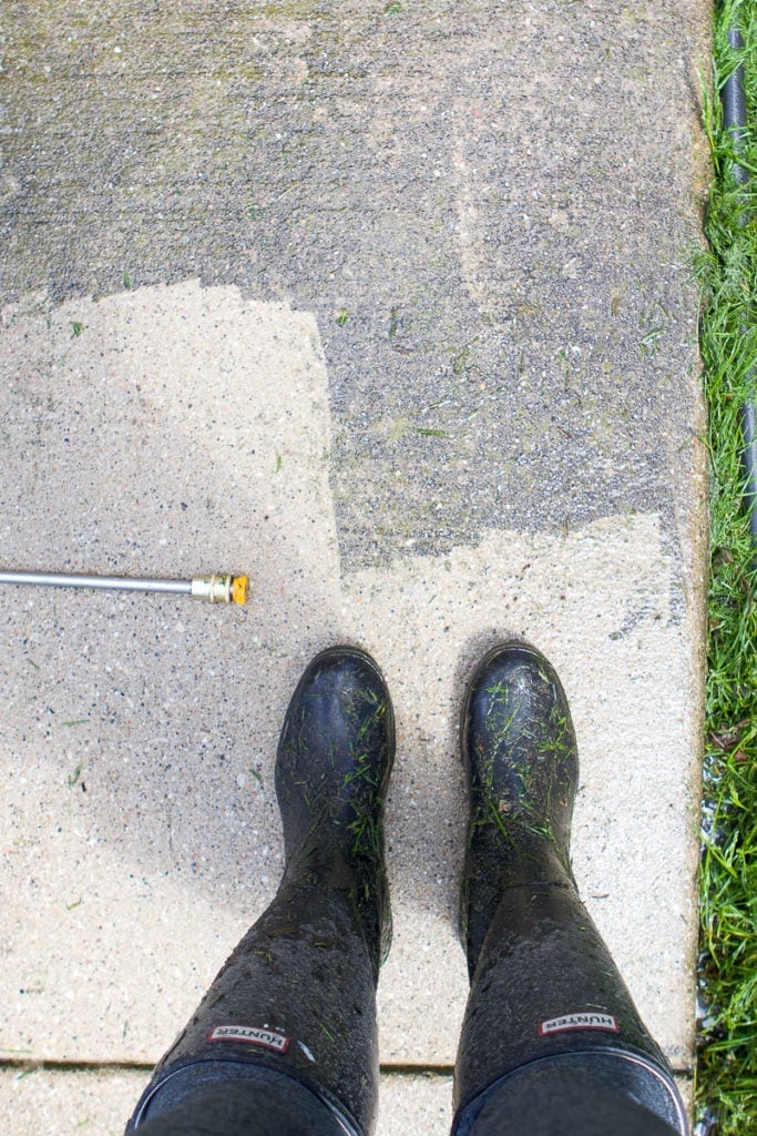 Power washing the sidewalk