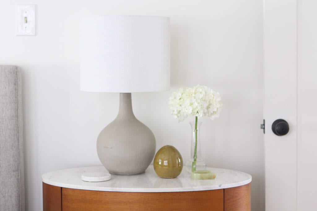Neutral nightstand and accessories