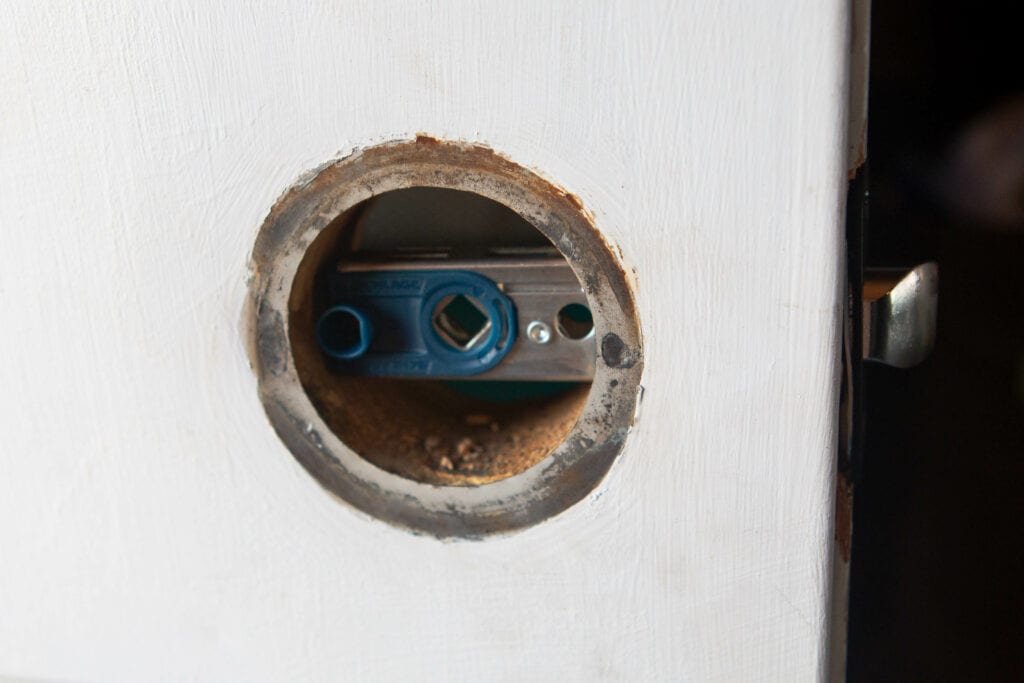 Installing a latch for the knobs