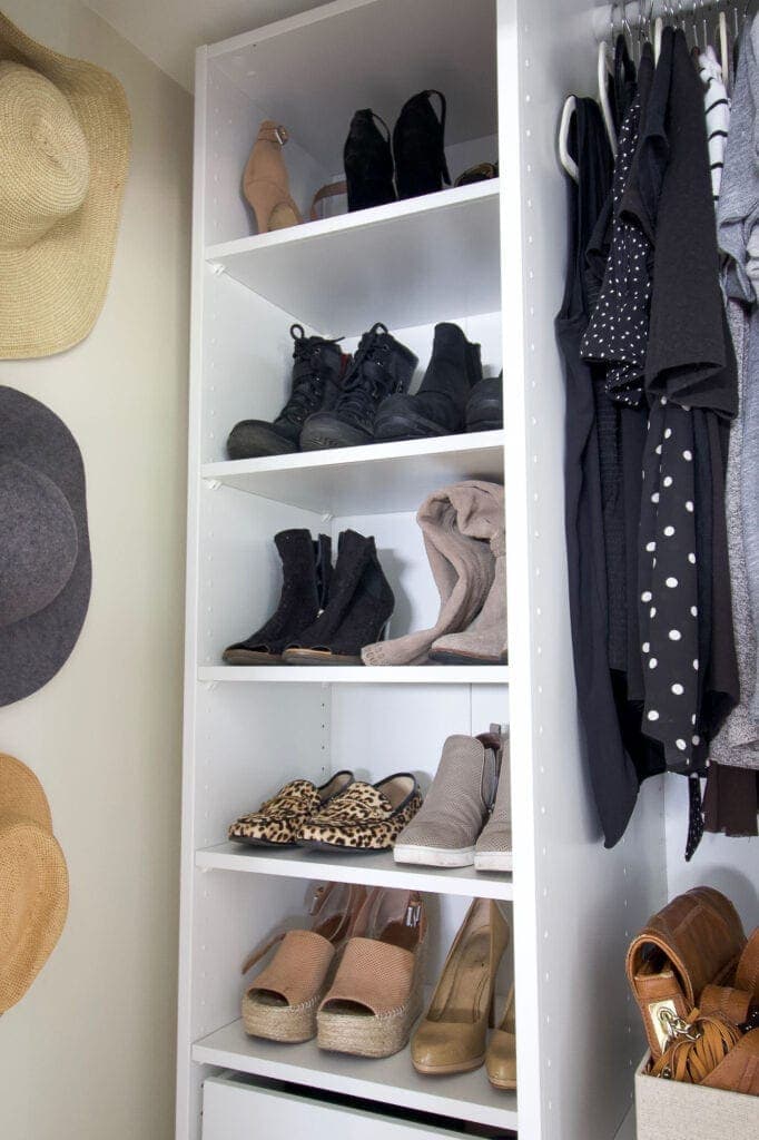 Shoes on shelves in an ikea closet