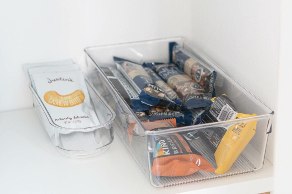 Granola bars in a clear bin