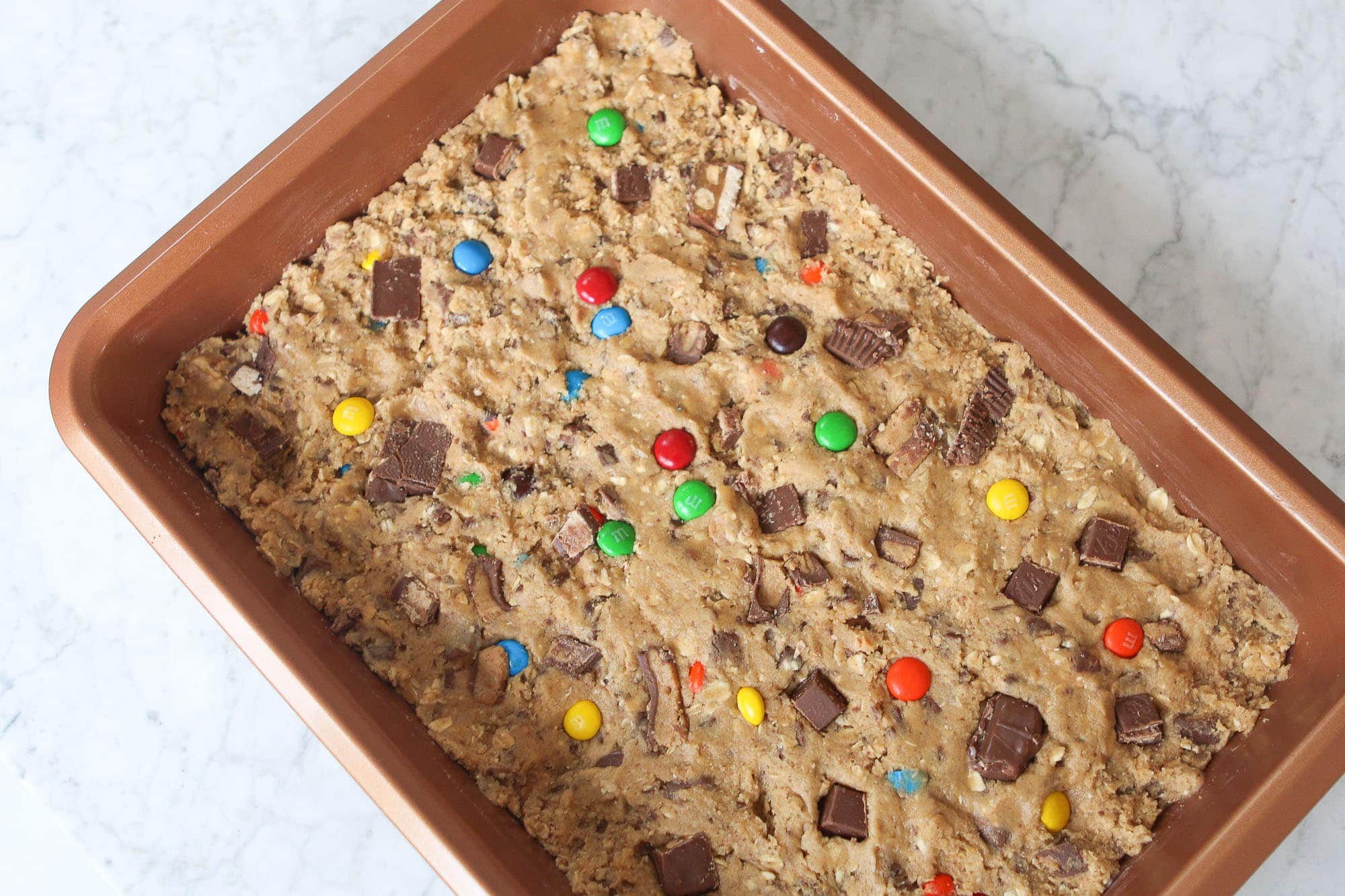 Press the dough into the baking pan