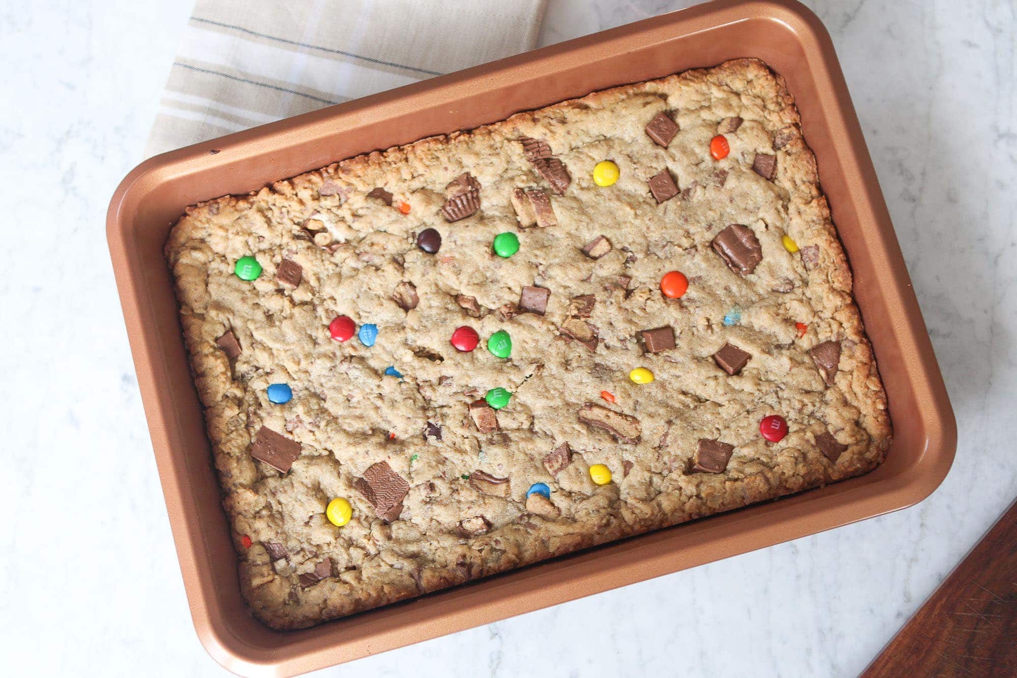 Loaded cookie bar recipe using leftover halloween candy