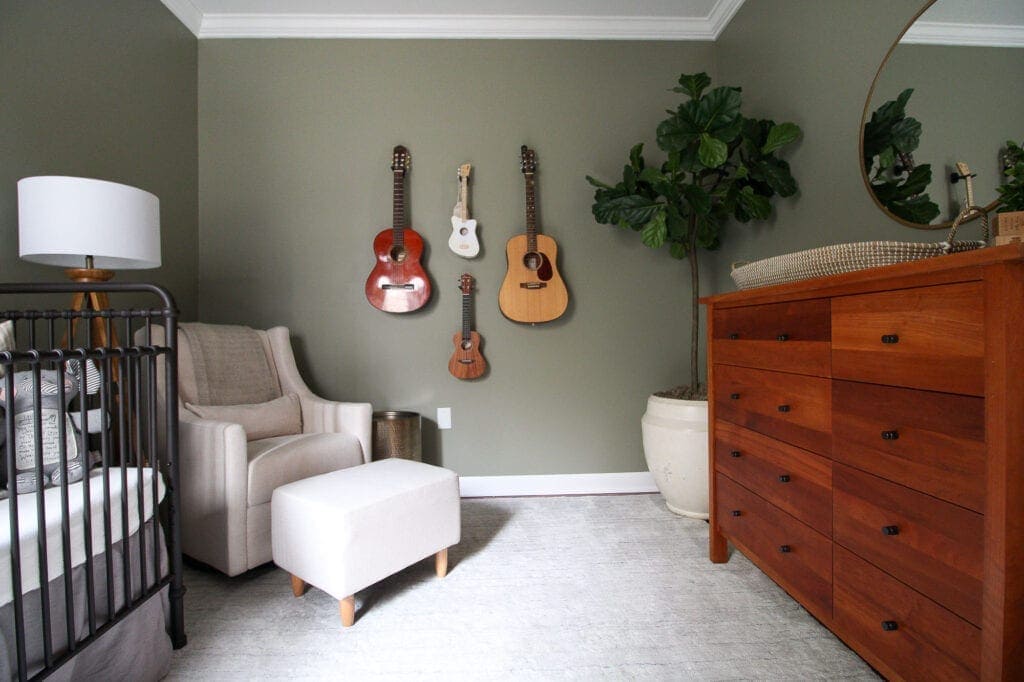 A nursery with sage green walls