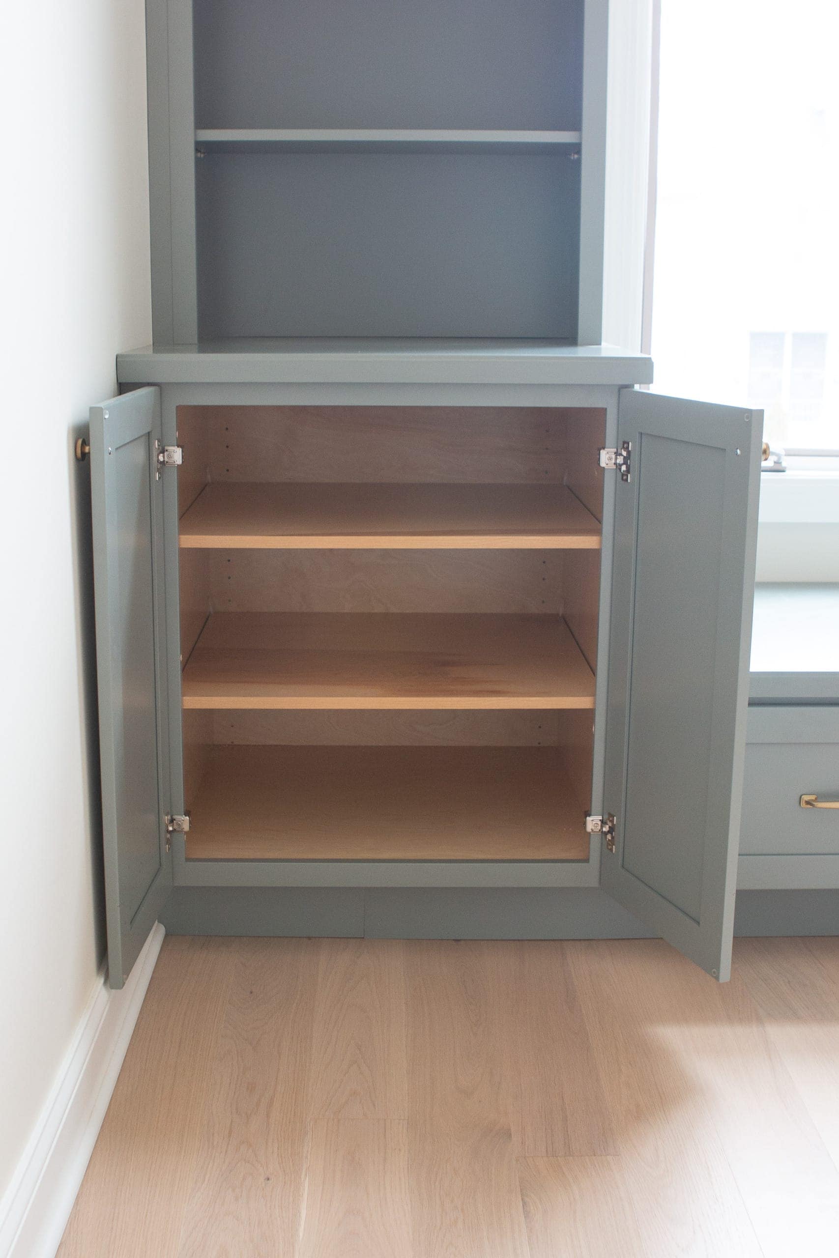 Cabinets in our nursery built-ins