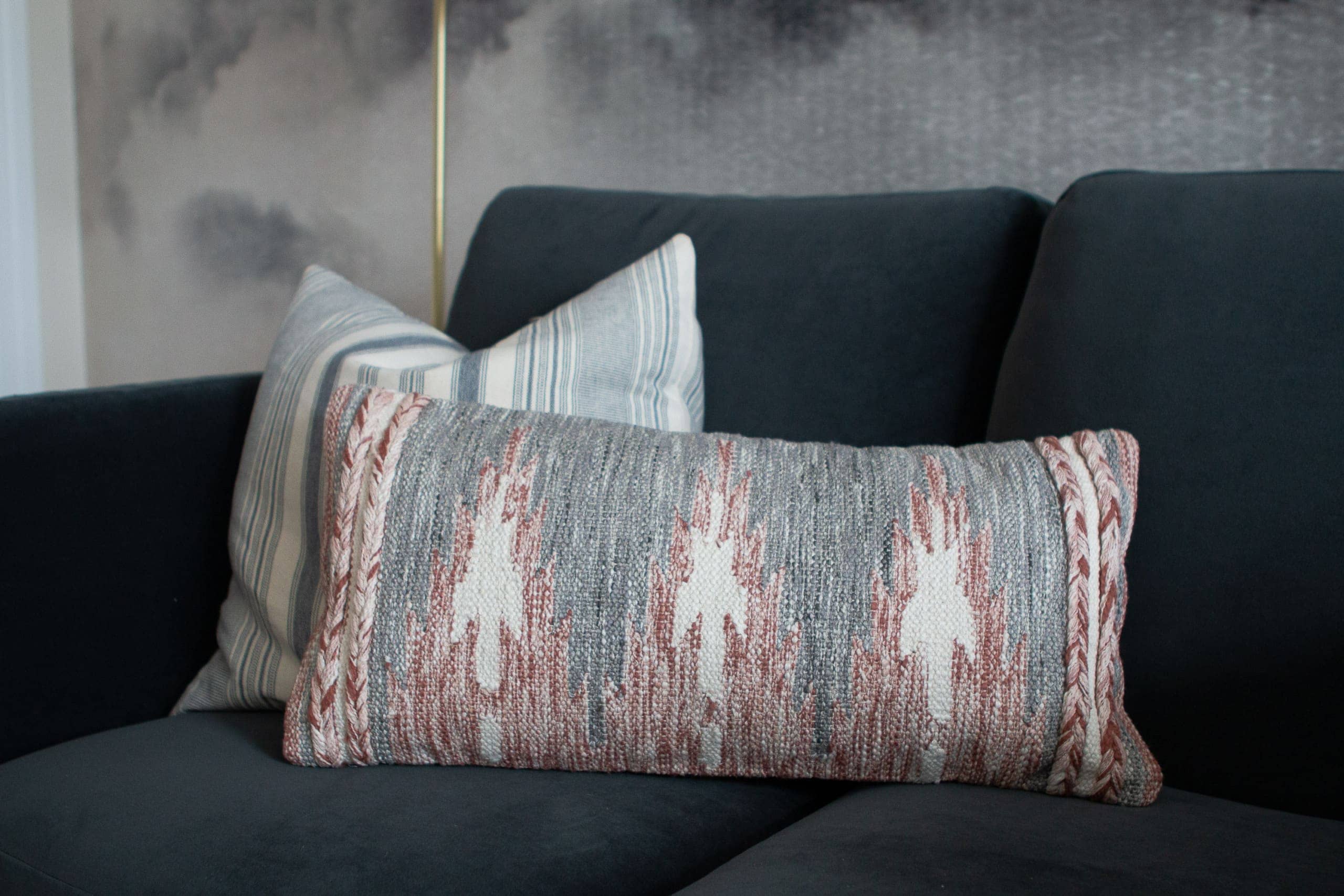 Pillows on a dark navy couch