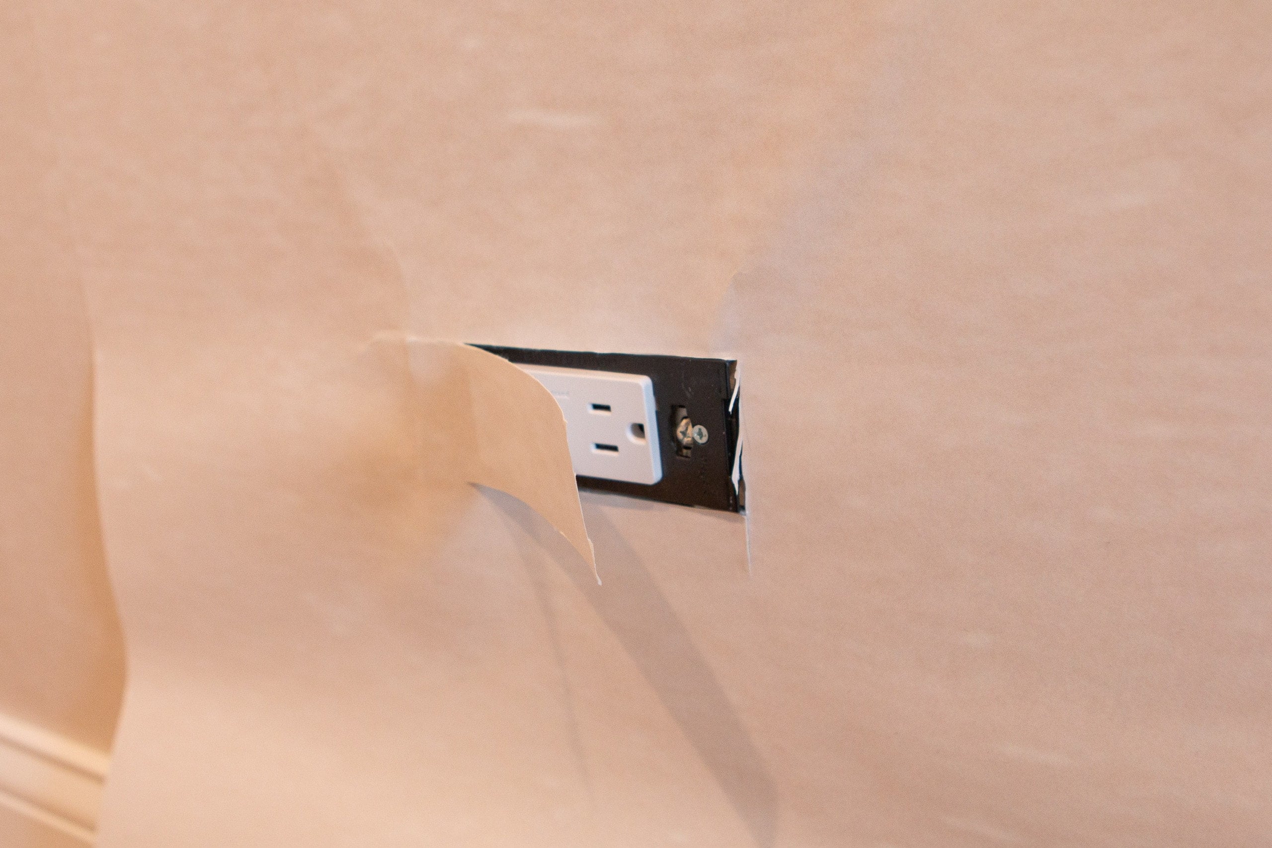 Cutting around an outlet. 