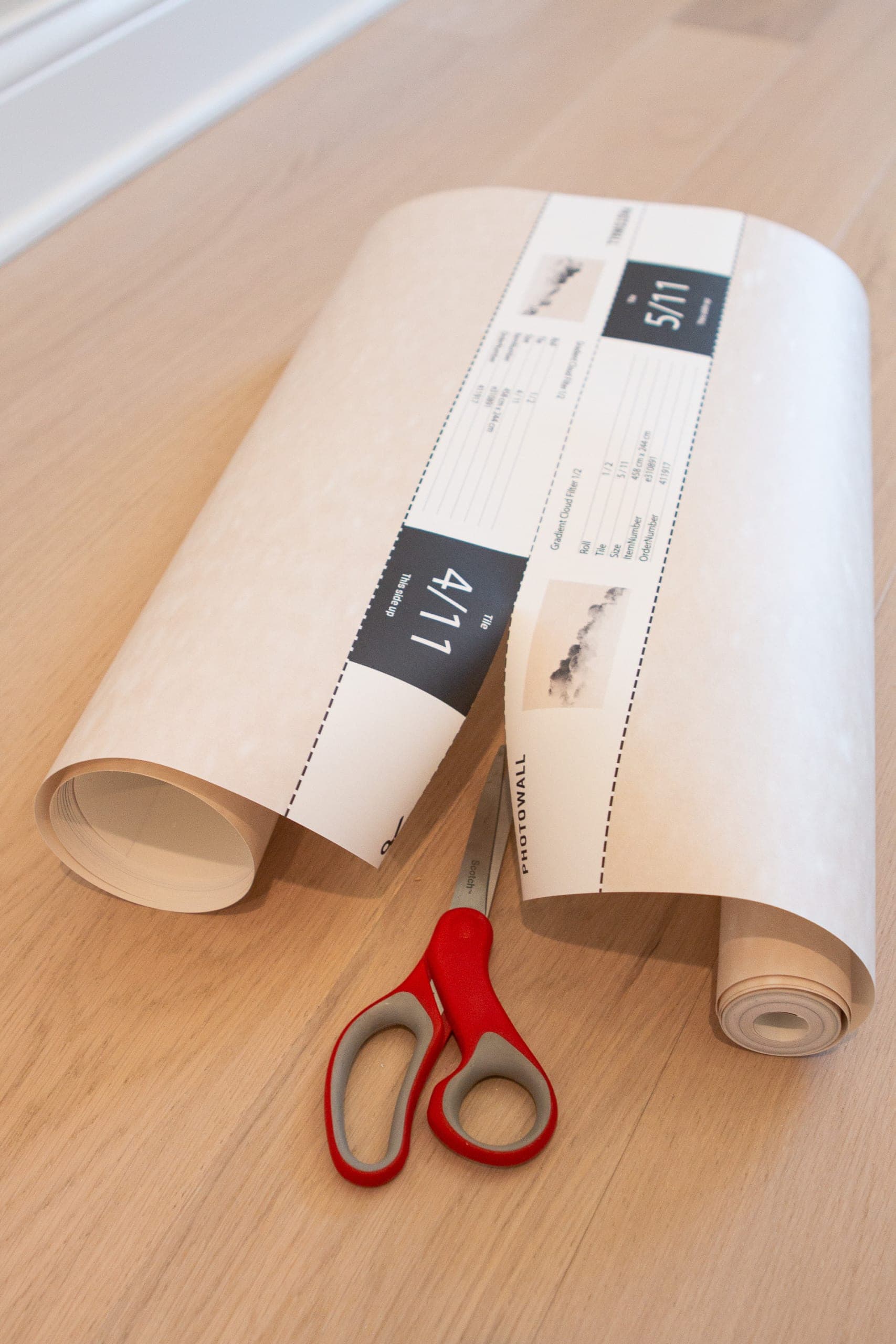 Cutting the second strip in your wall mural