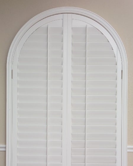 Plantation shutters for arched window