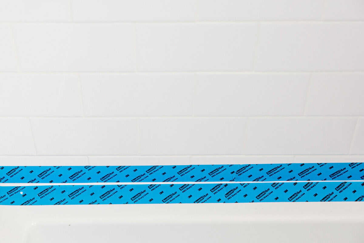 make sure you use painter's tape when using silicone caulk to recaulk your bathtub