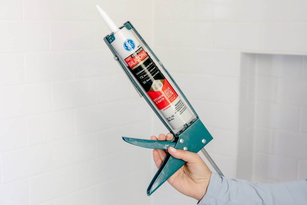 use silicone caulk and a caulk gun when you recaulk your bathtub