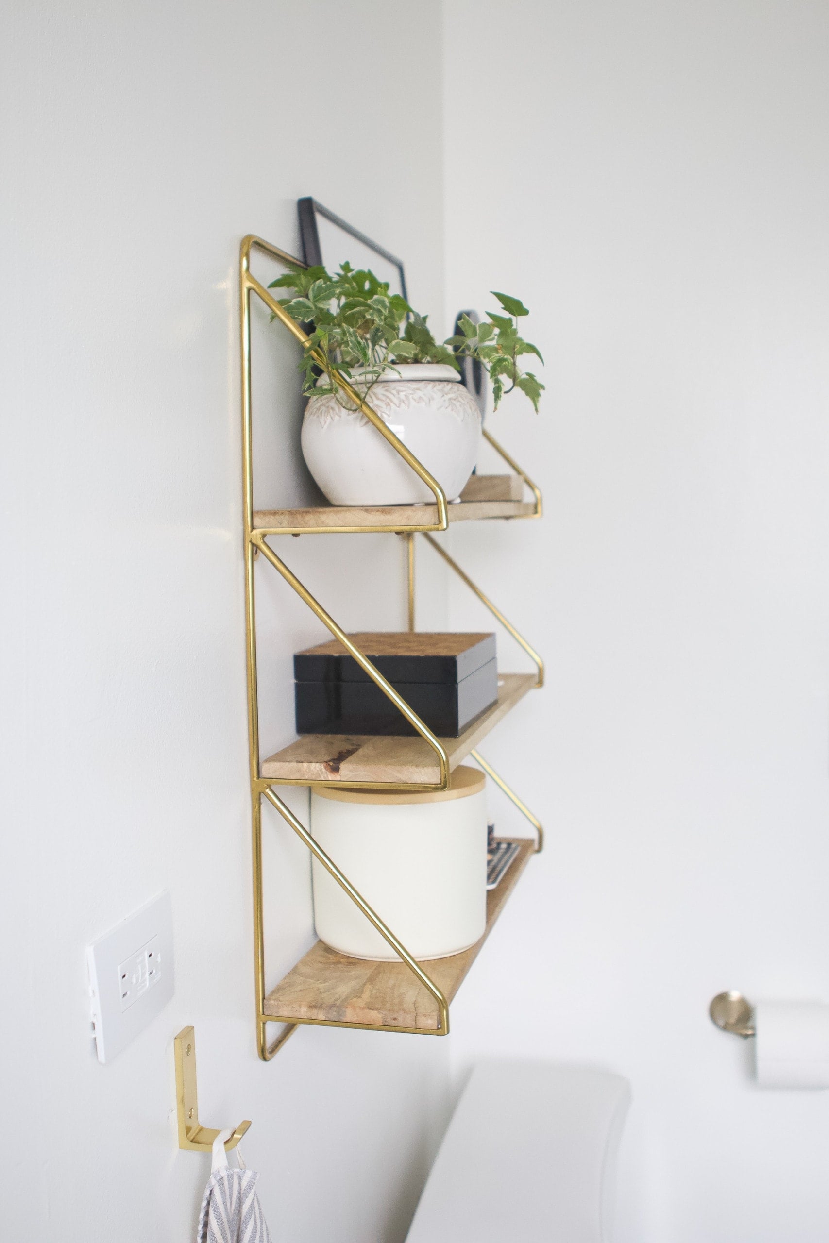 Wood shelves over the toilet