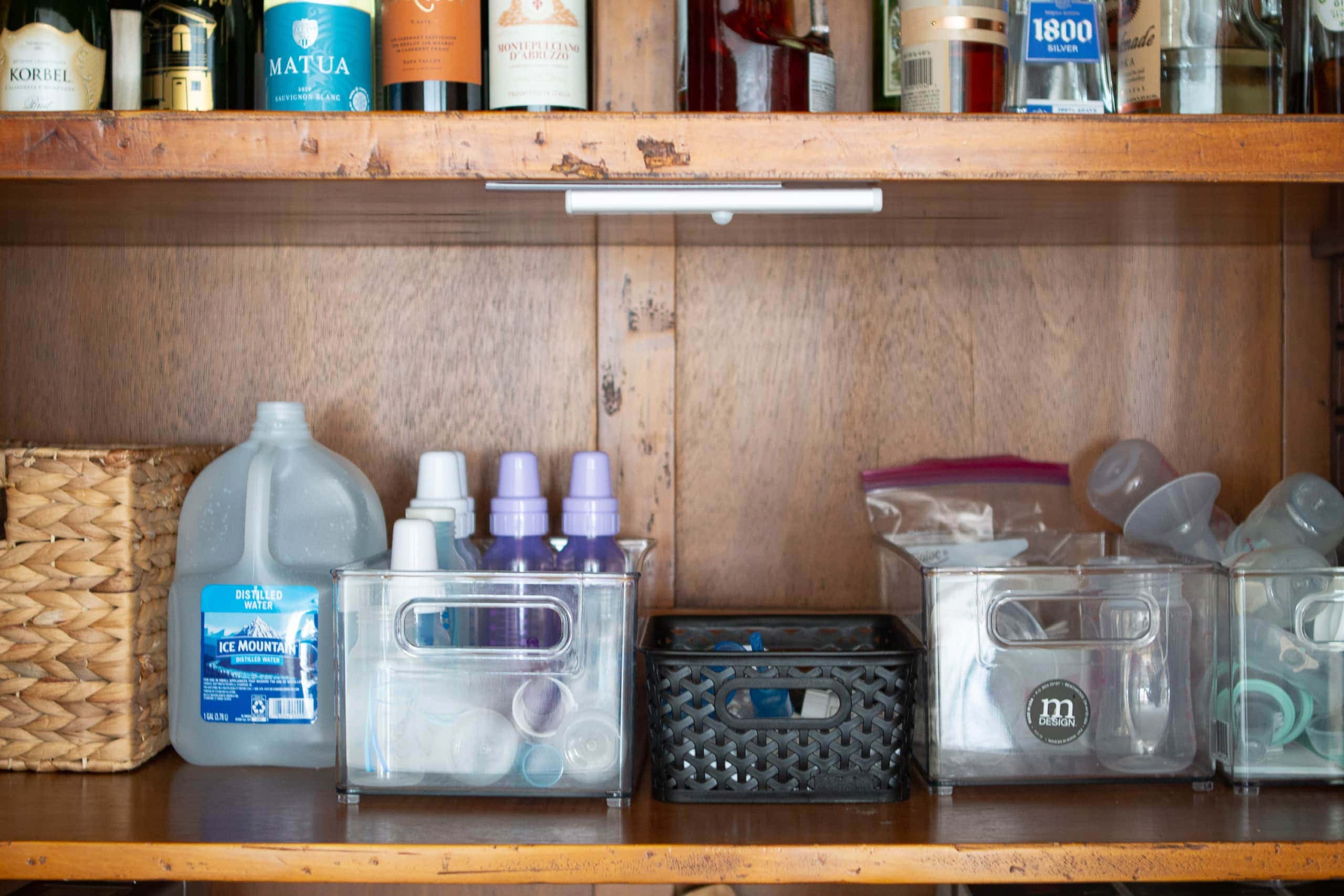 Adding motion sensor lights to the inside of a cabinet