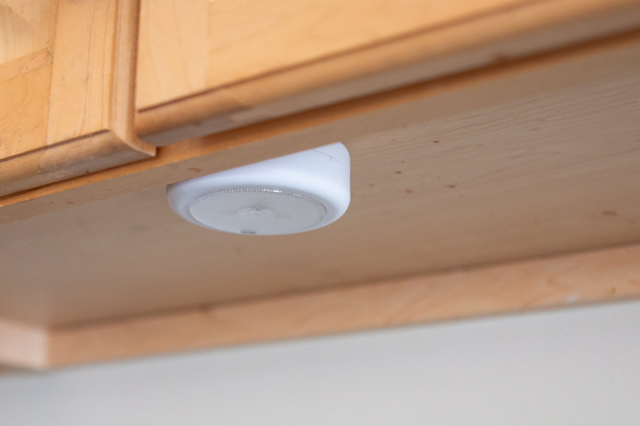 Puck lights under the kitchen cabinets