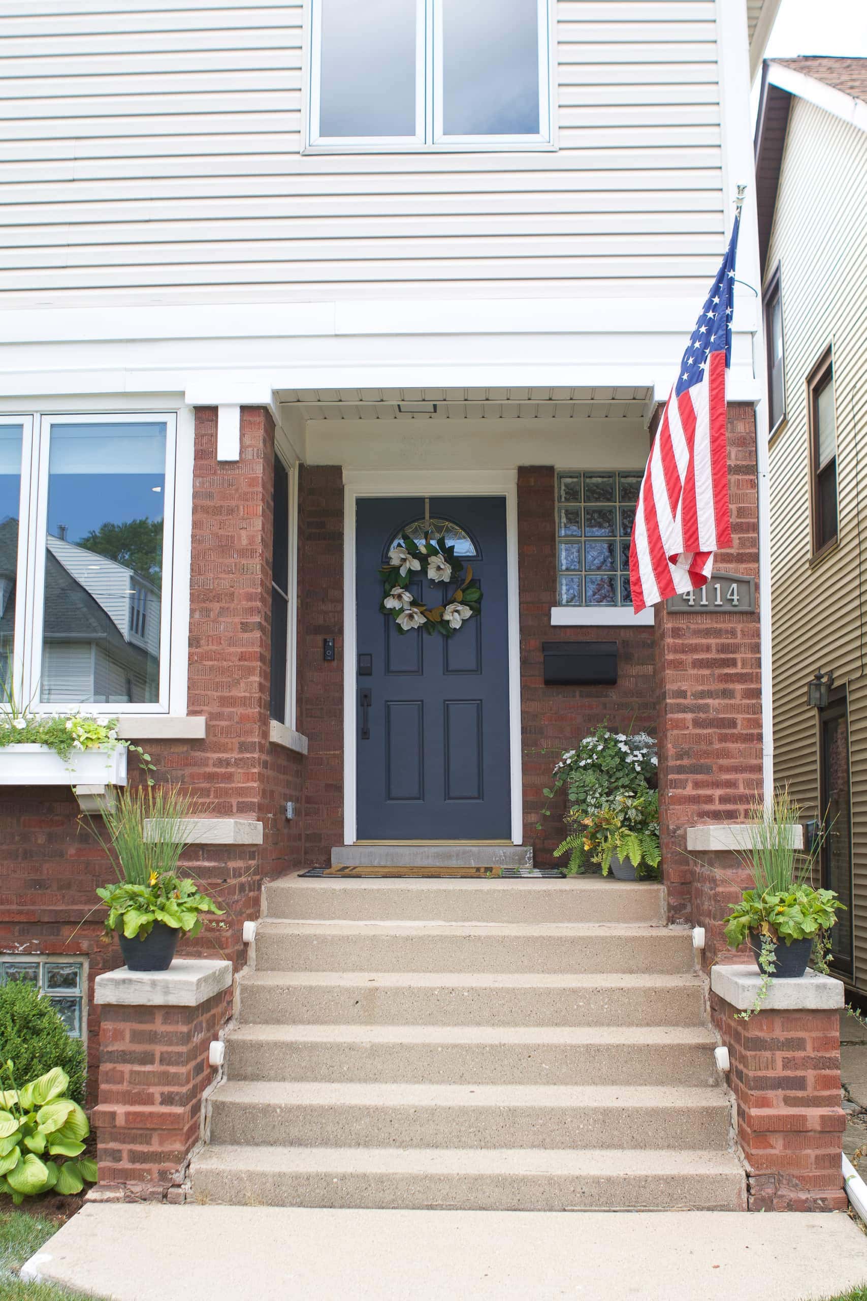Our front porch and new flag pole
