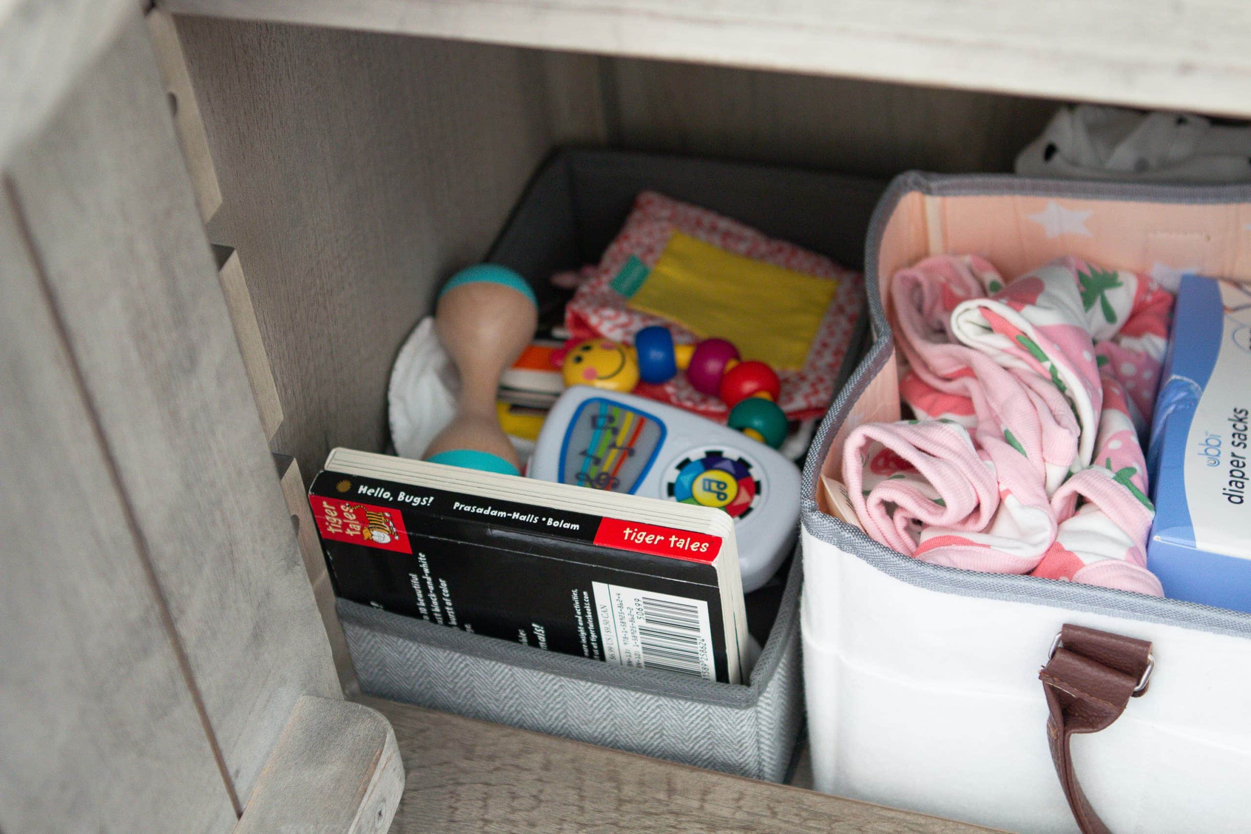 Our baby storage in the TV console
