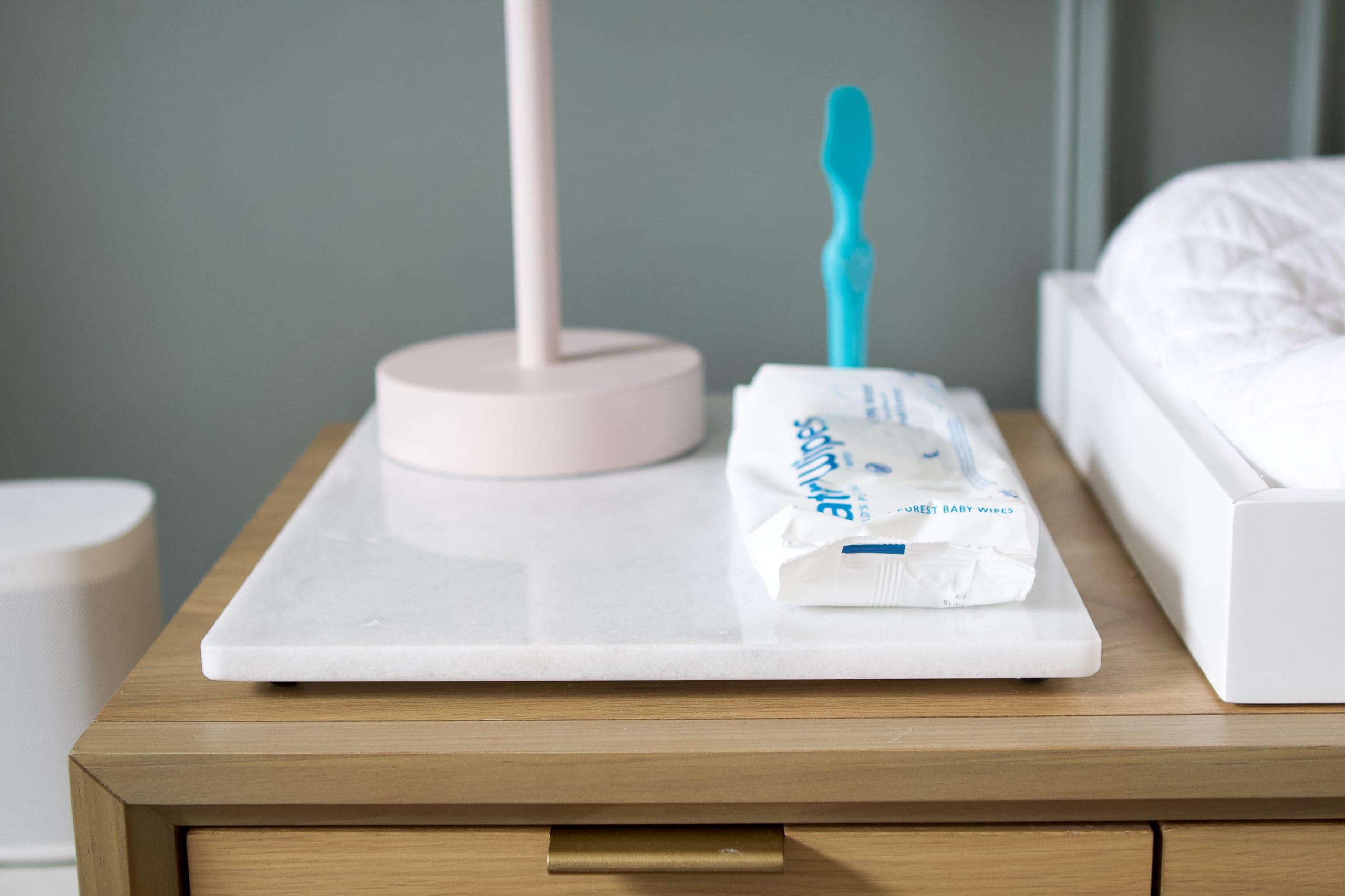 Marble tray on top of a dresser in a nursery