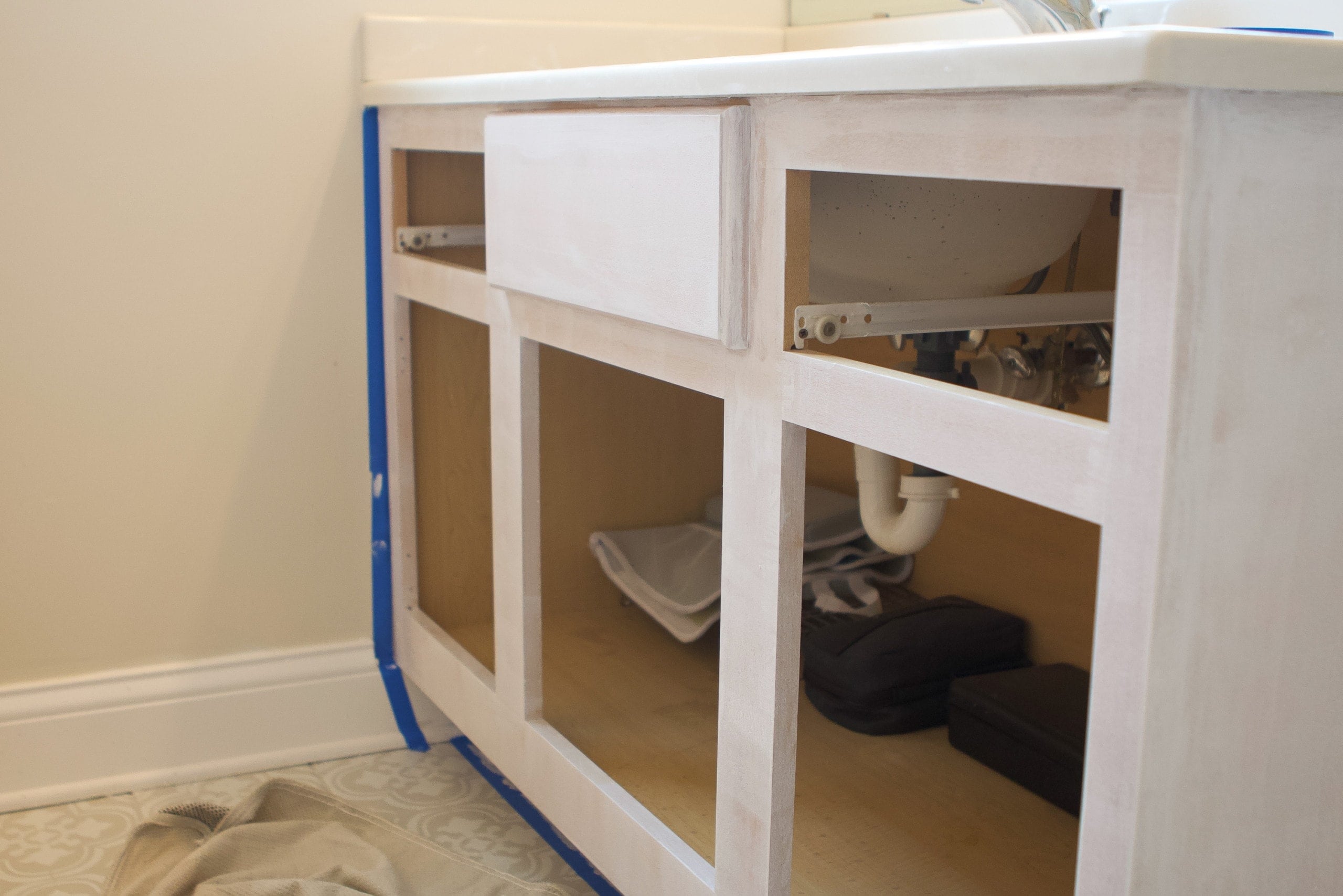 tape off your vanity when priming