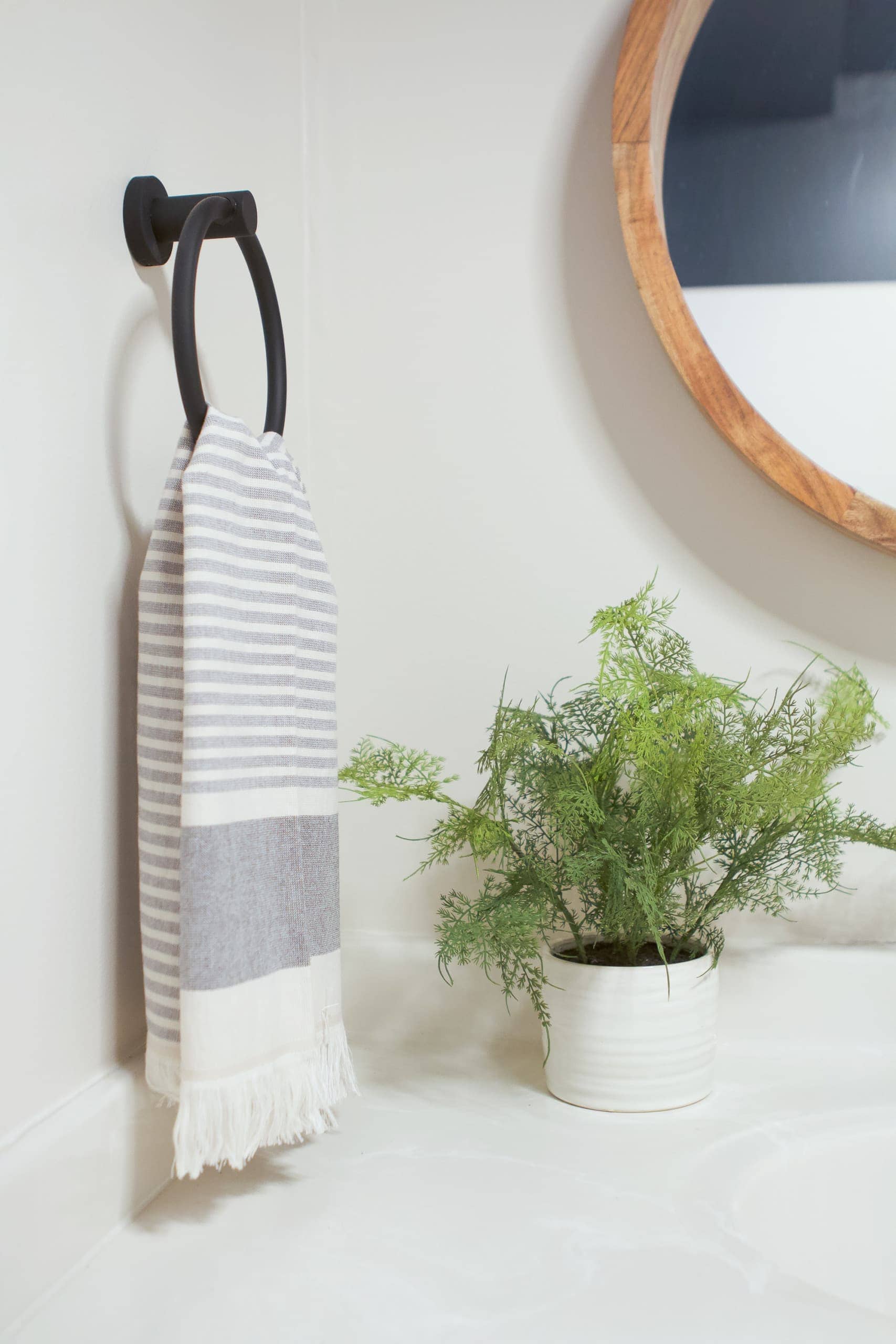 Adding a new towel ring for basement bathroom updates