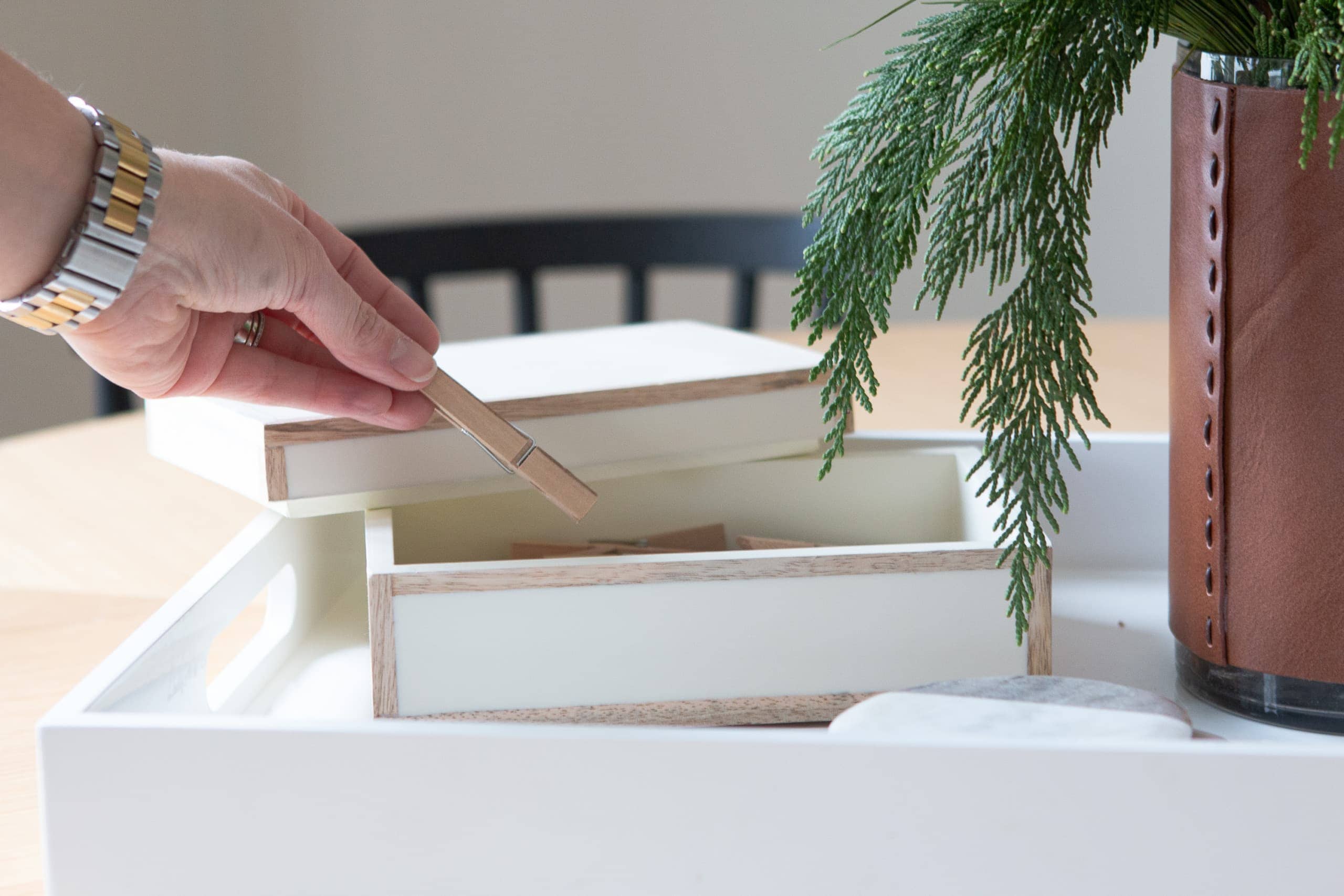 Clothespins are kept in a pretty box