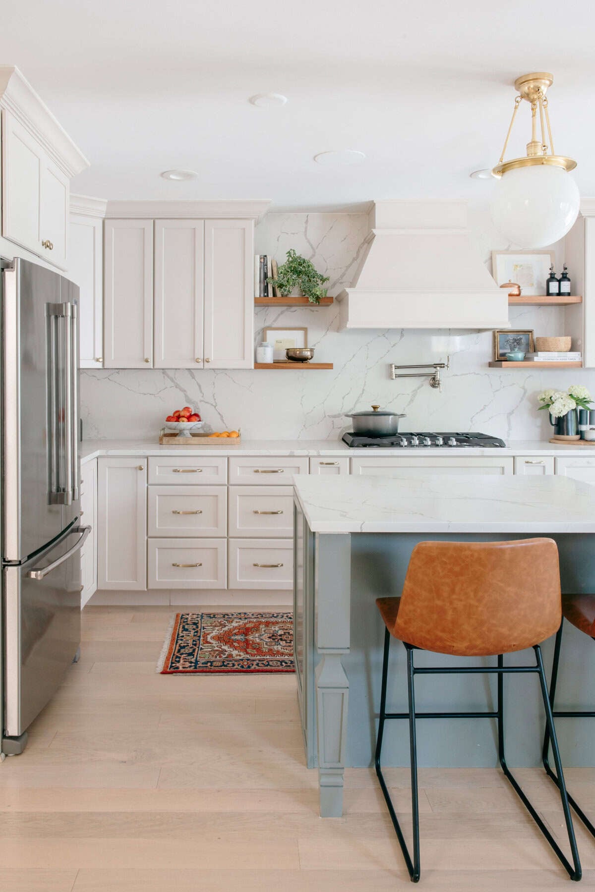 Vintage runner rug styled in a white kitchen with hardwood floors