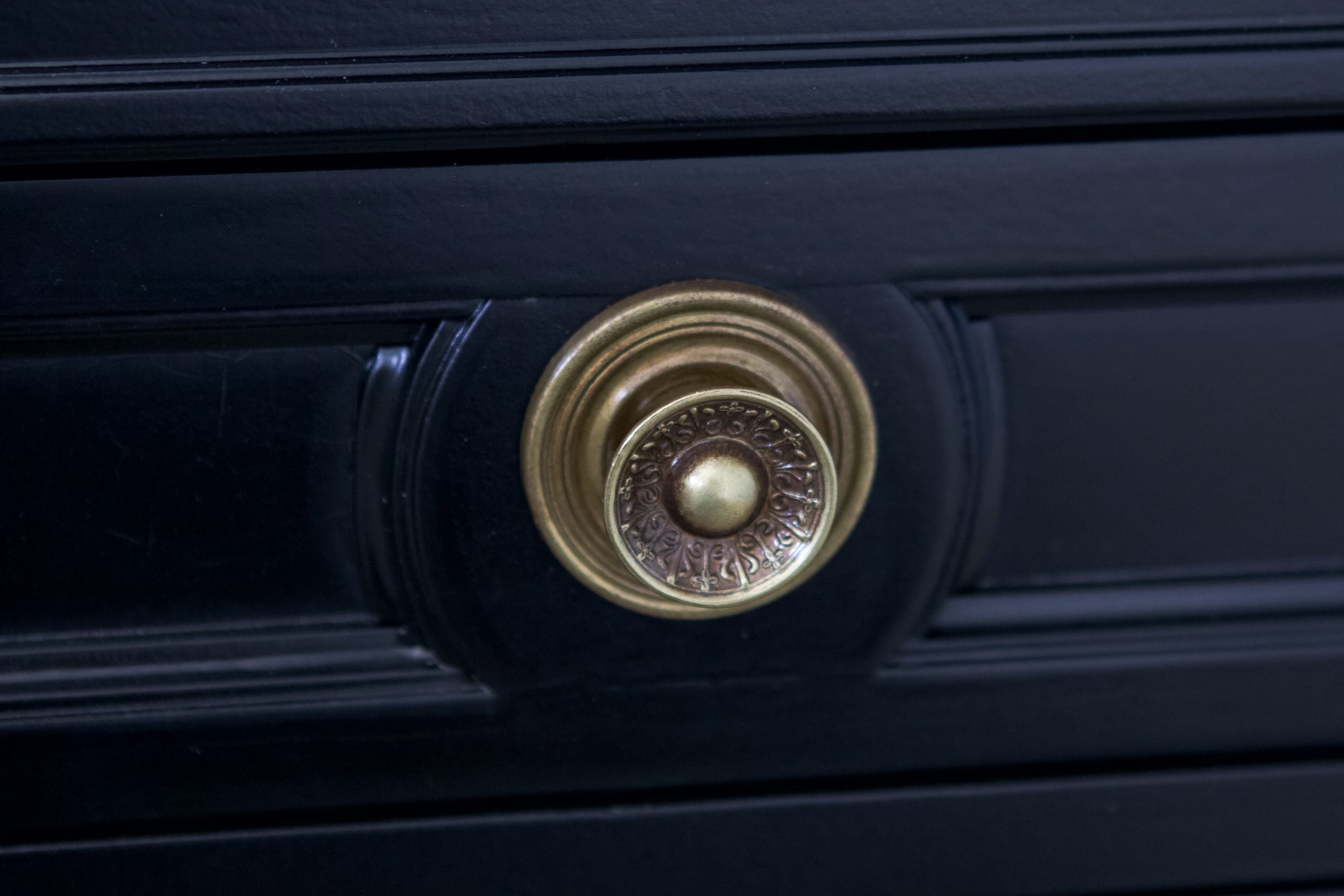 Brass detailing on the nightstands
