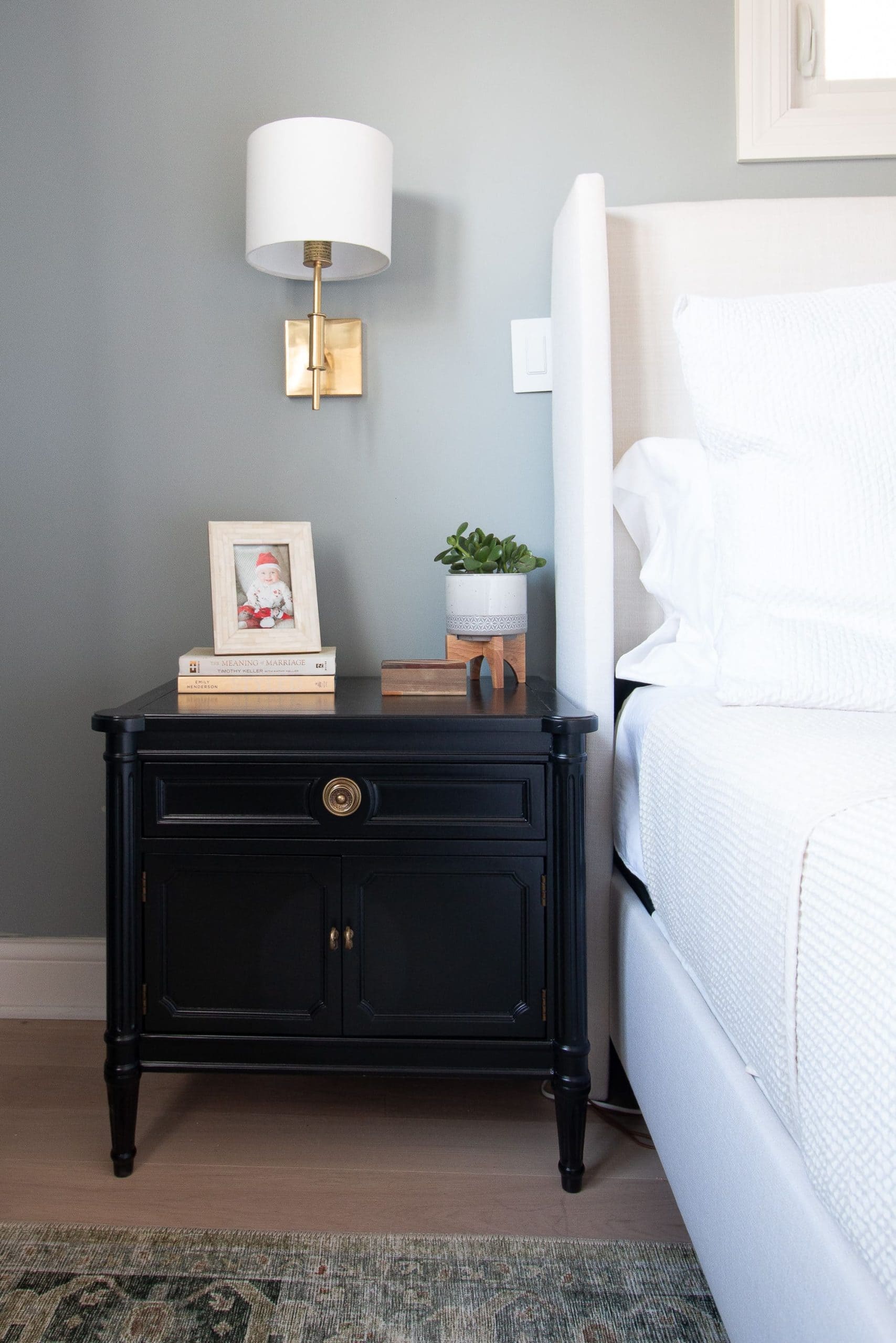 Our vintage black nightstands