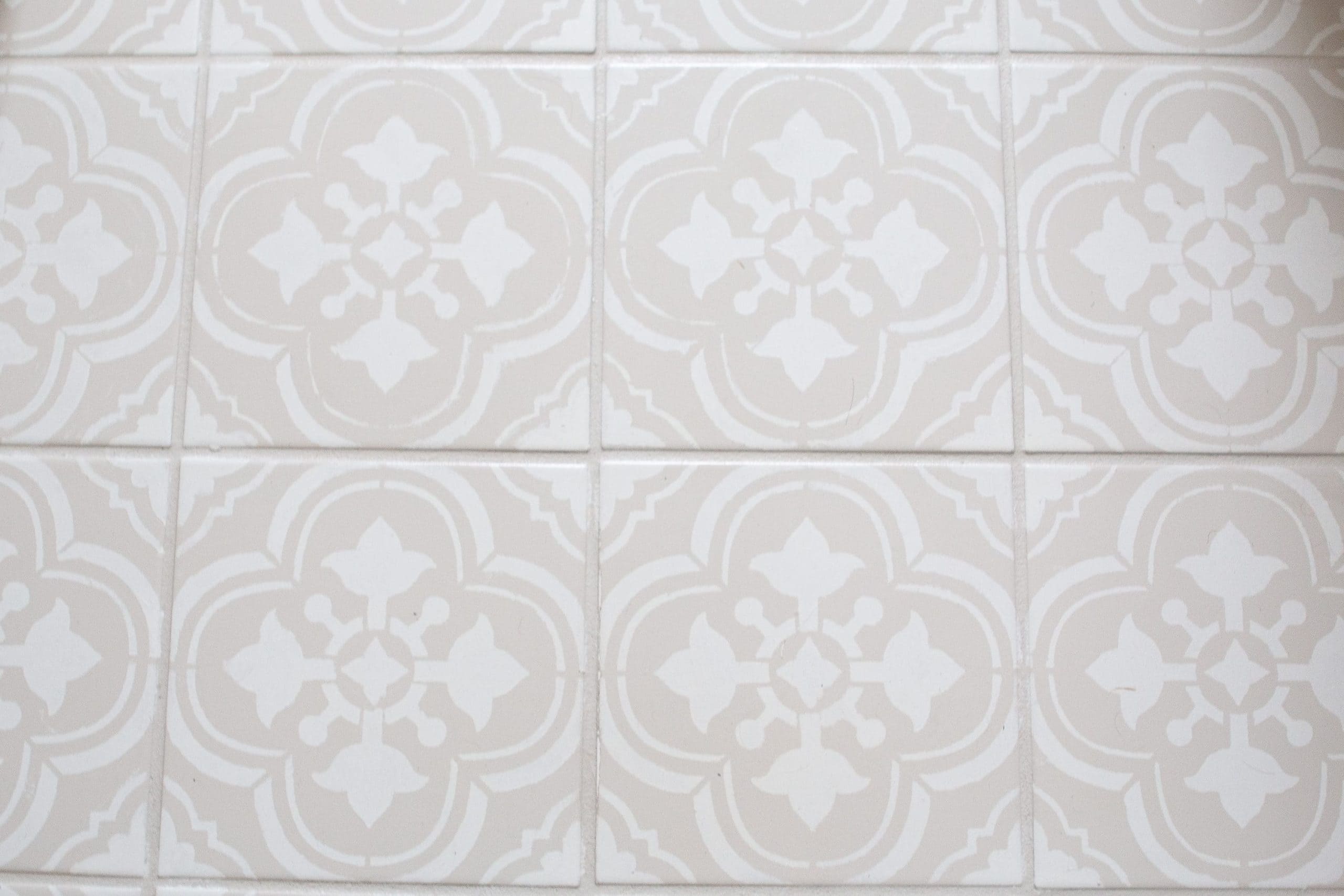 Grading my painted tile floors