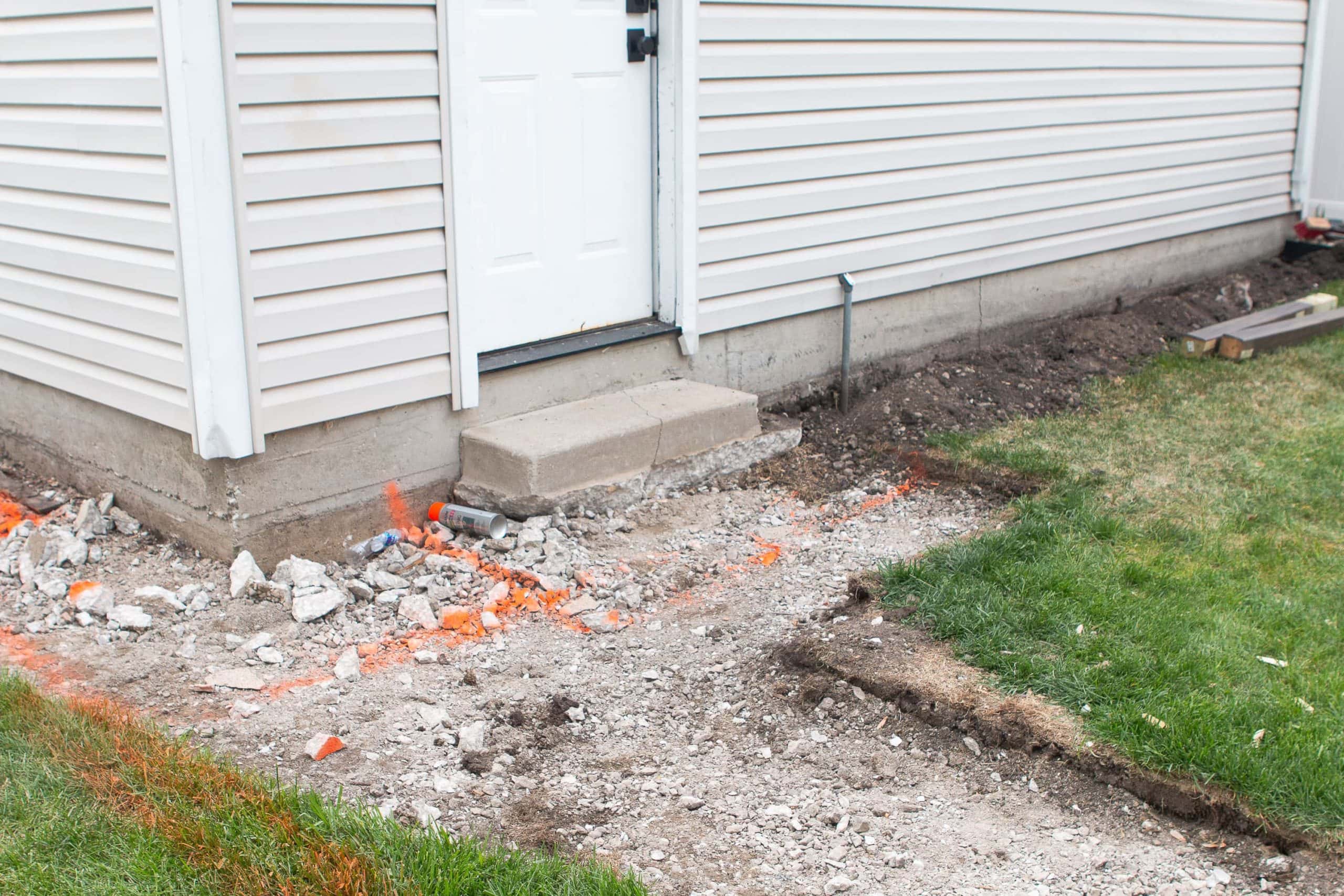 Removing the concrete in our backyard
