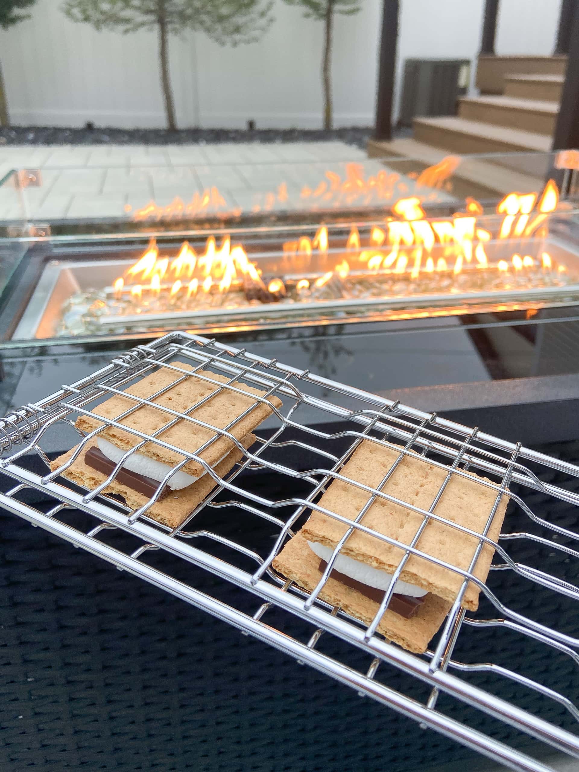 making s'mores on the back patio