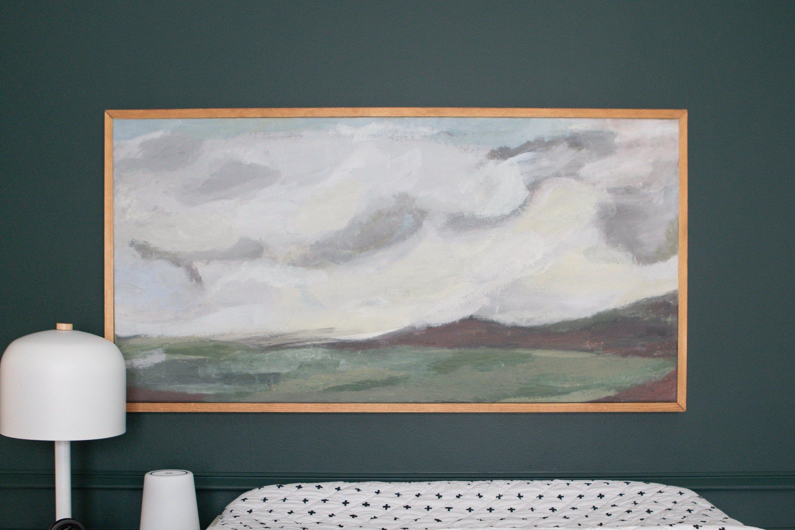 Adding art above the changing table as we make nursery design progress