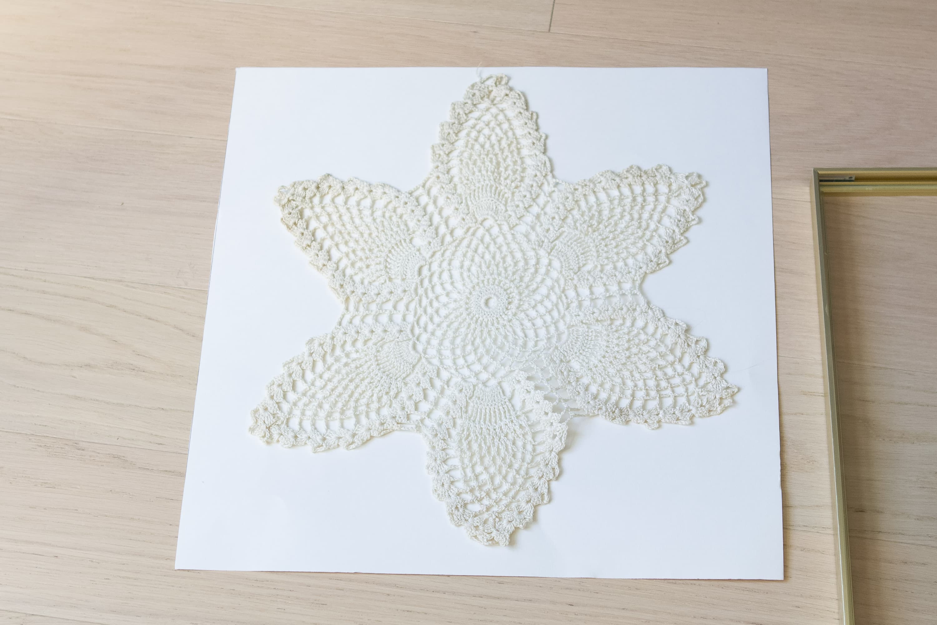 Using posterboard to display my doily