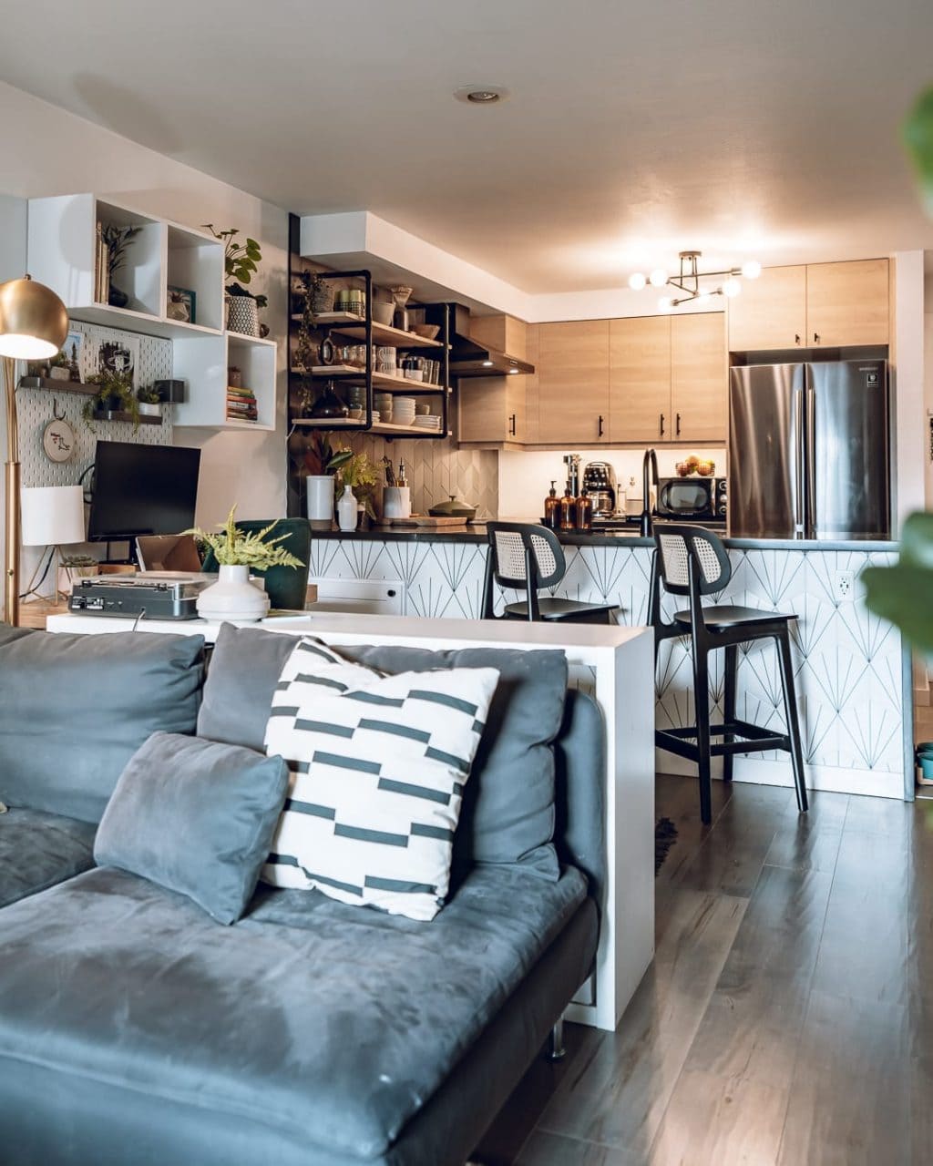 A living room in a moody condo