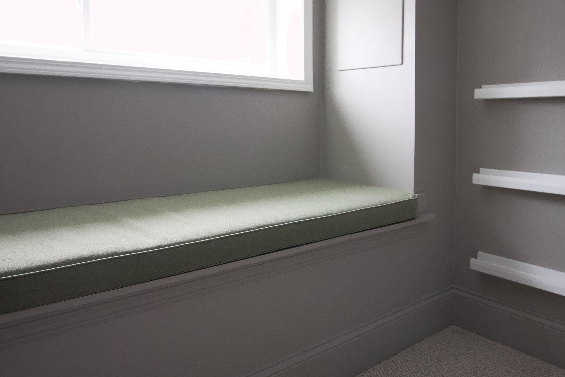 Our green cushion for our basement reading nook