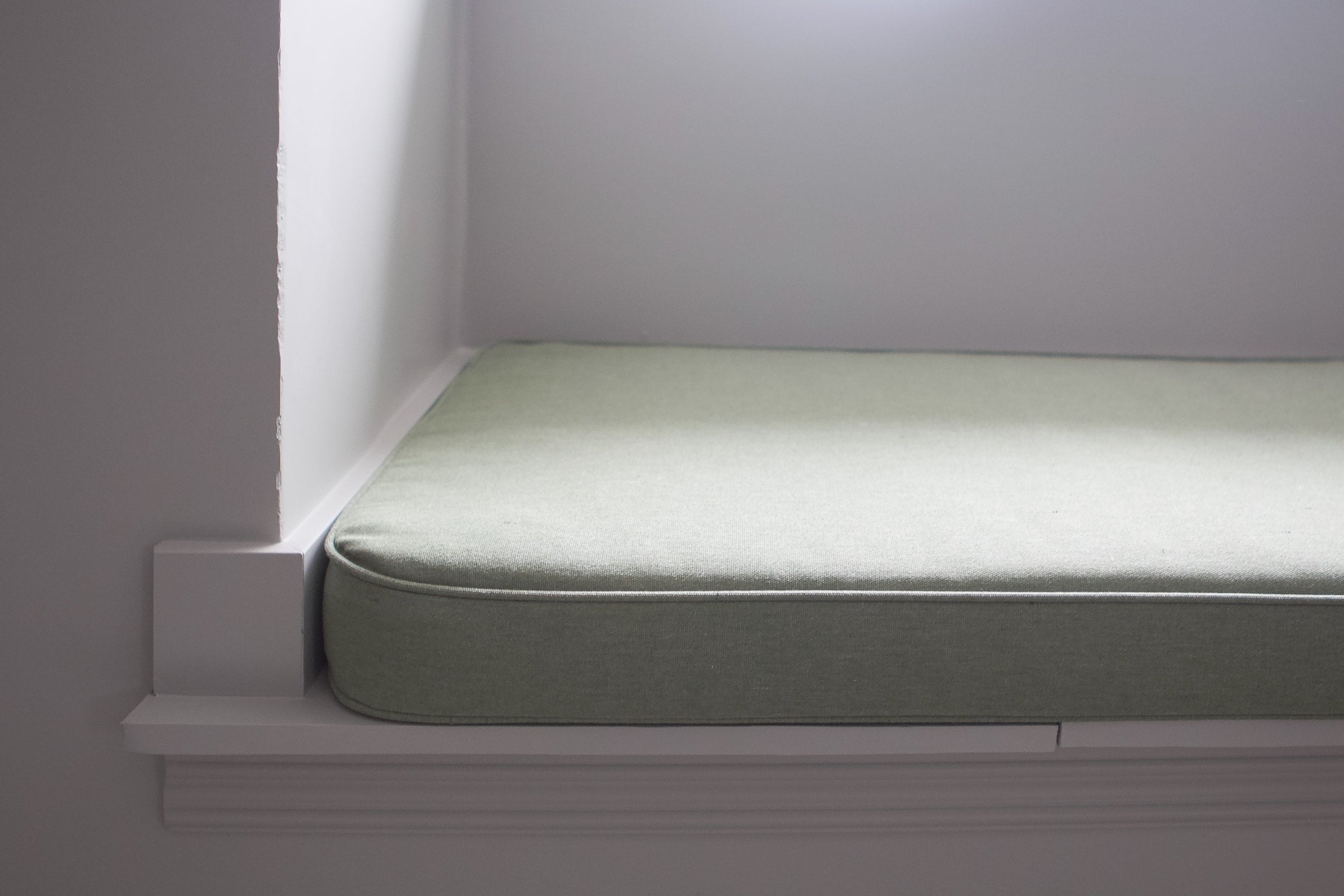 Our custom cushion from Patio Lane for the reading nook