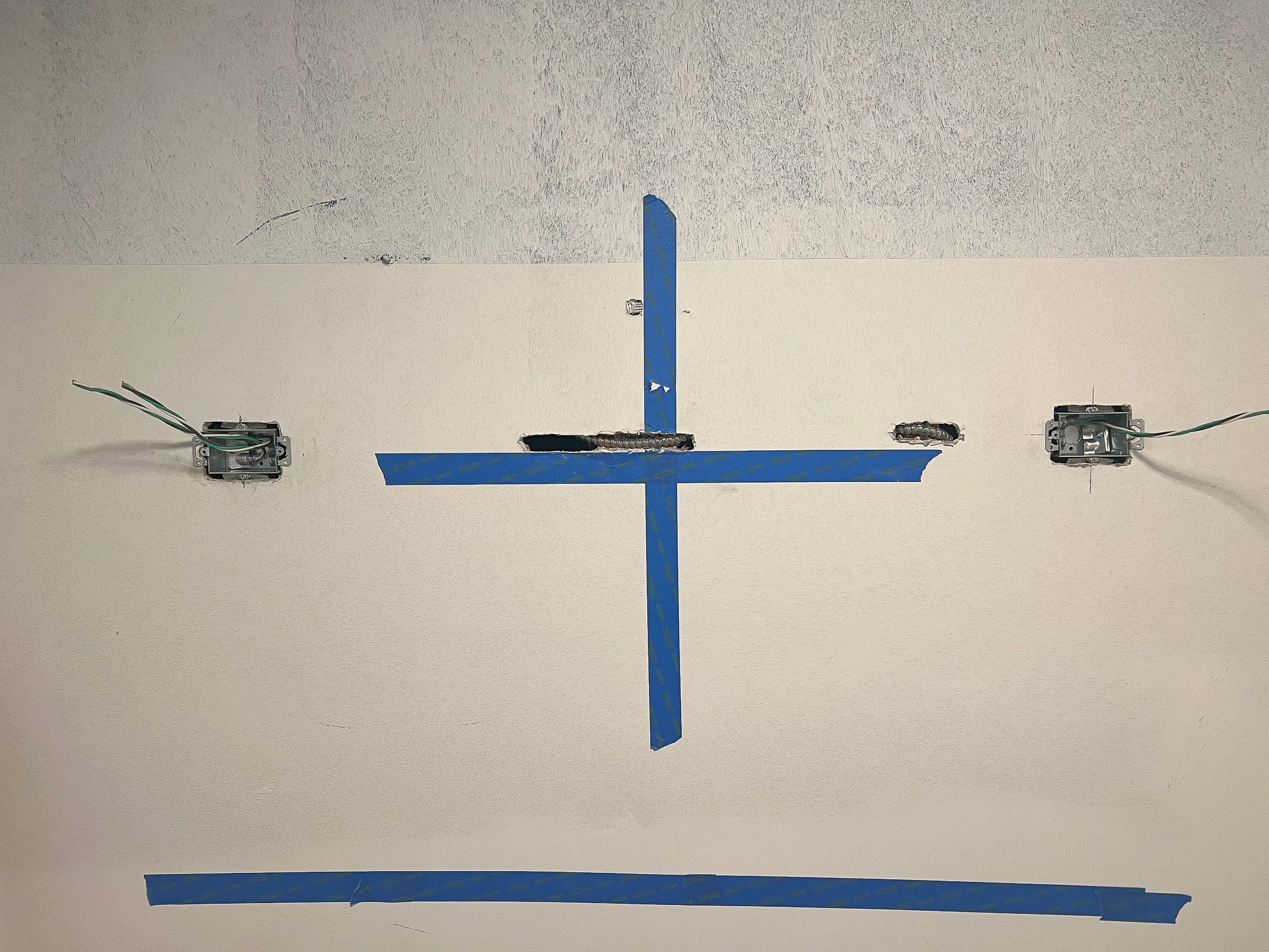 adding sconces to the wall for the bathroom