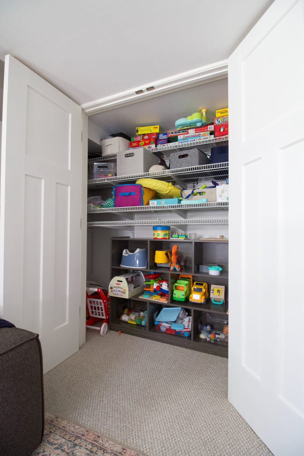 The playroom closet space needs some organization