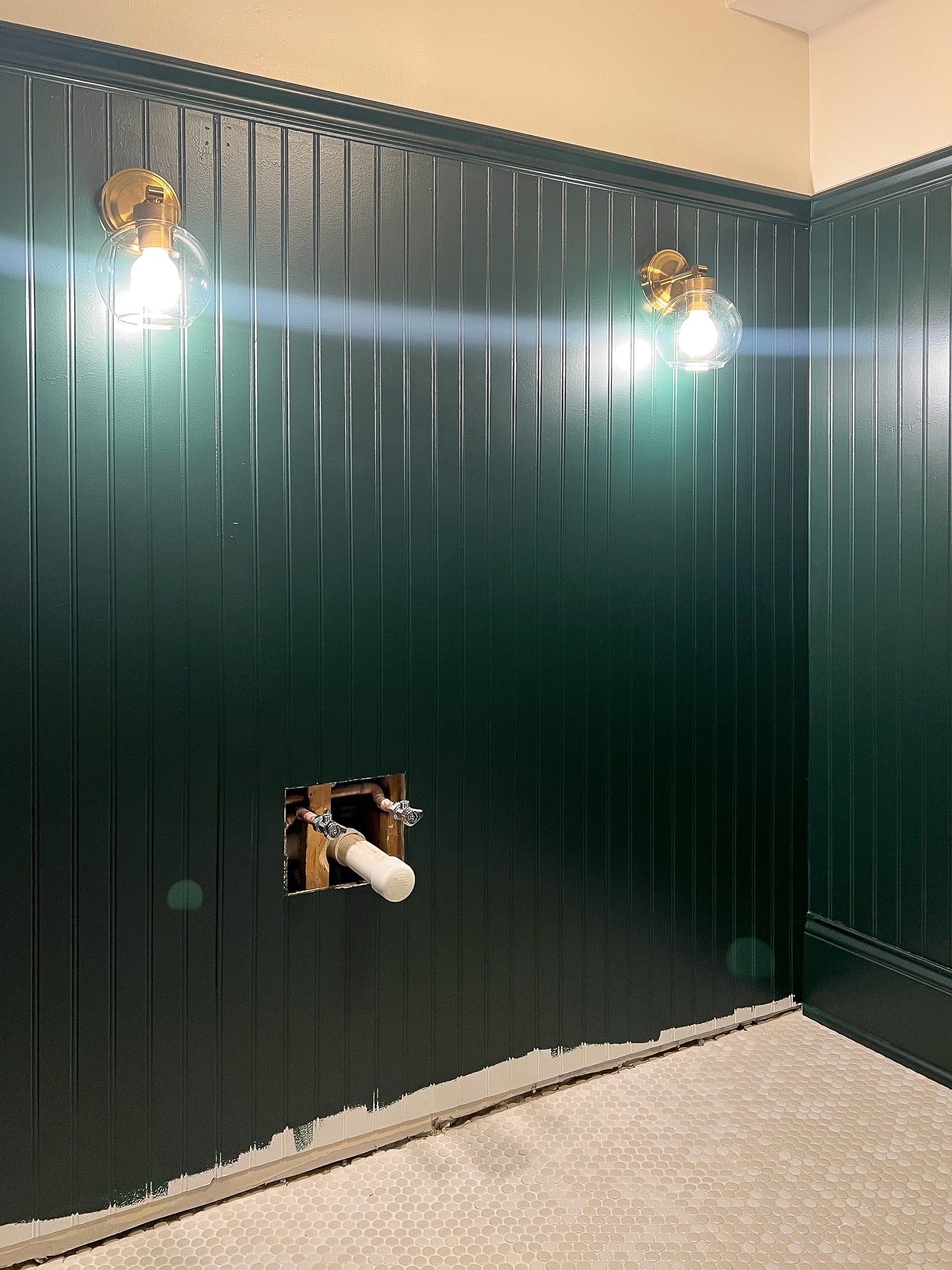 The sconces in the bathroom