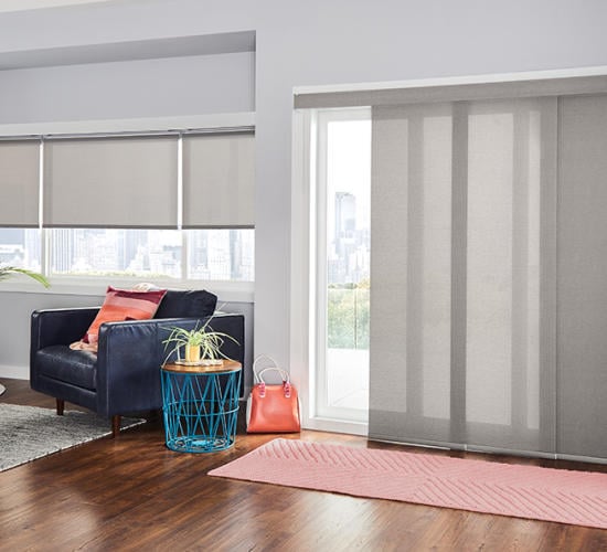Sliding track panel shades for a glass door