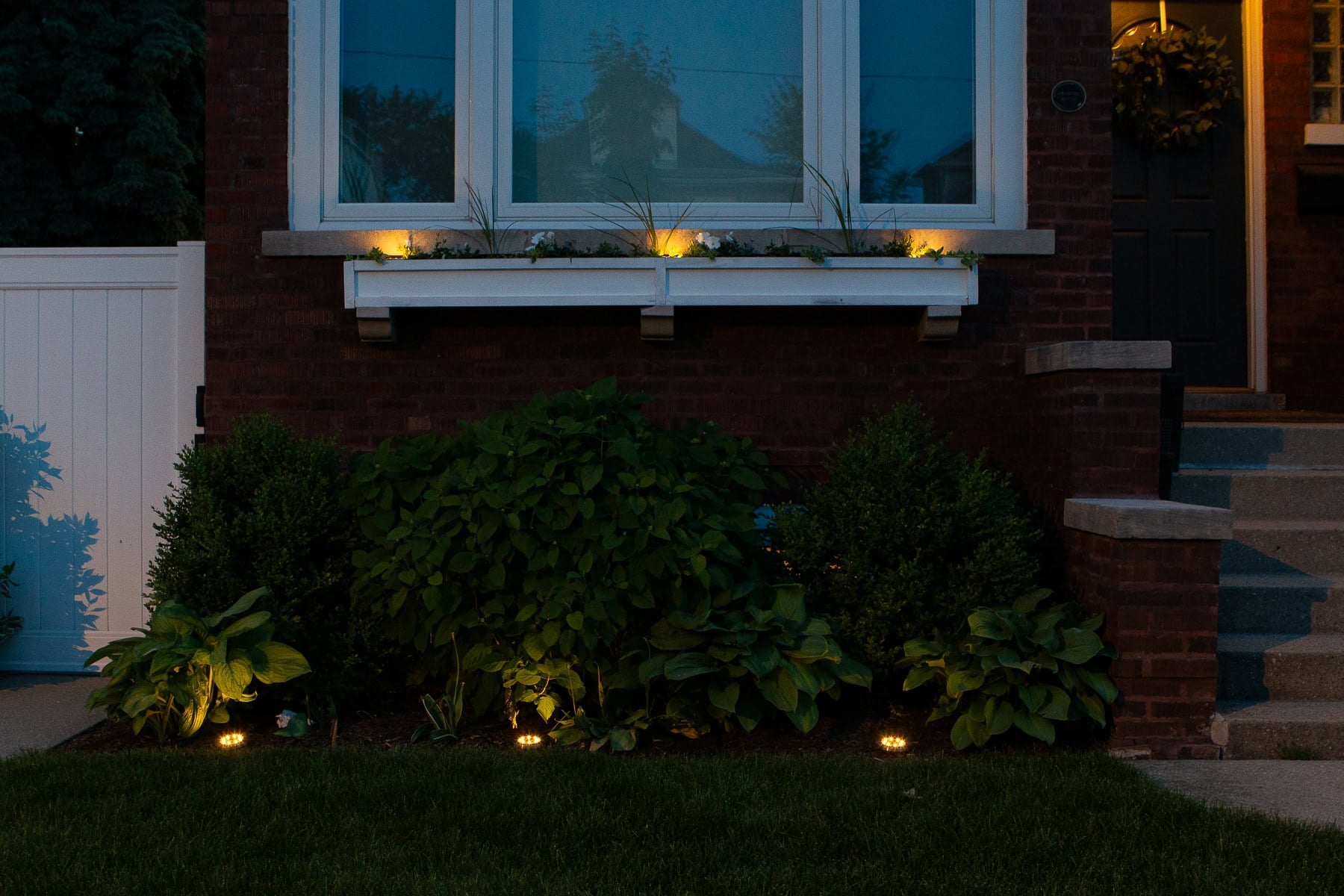 Adding solar lights to our front window box