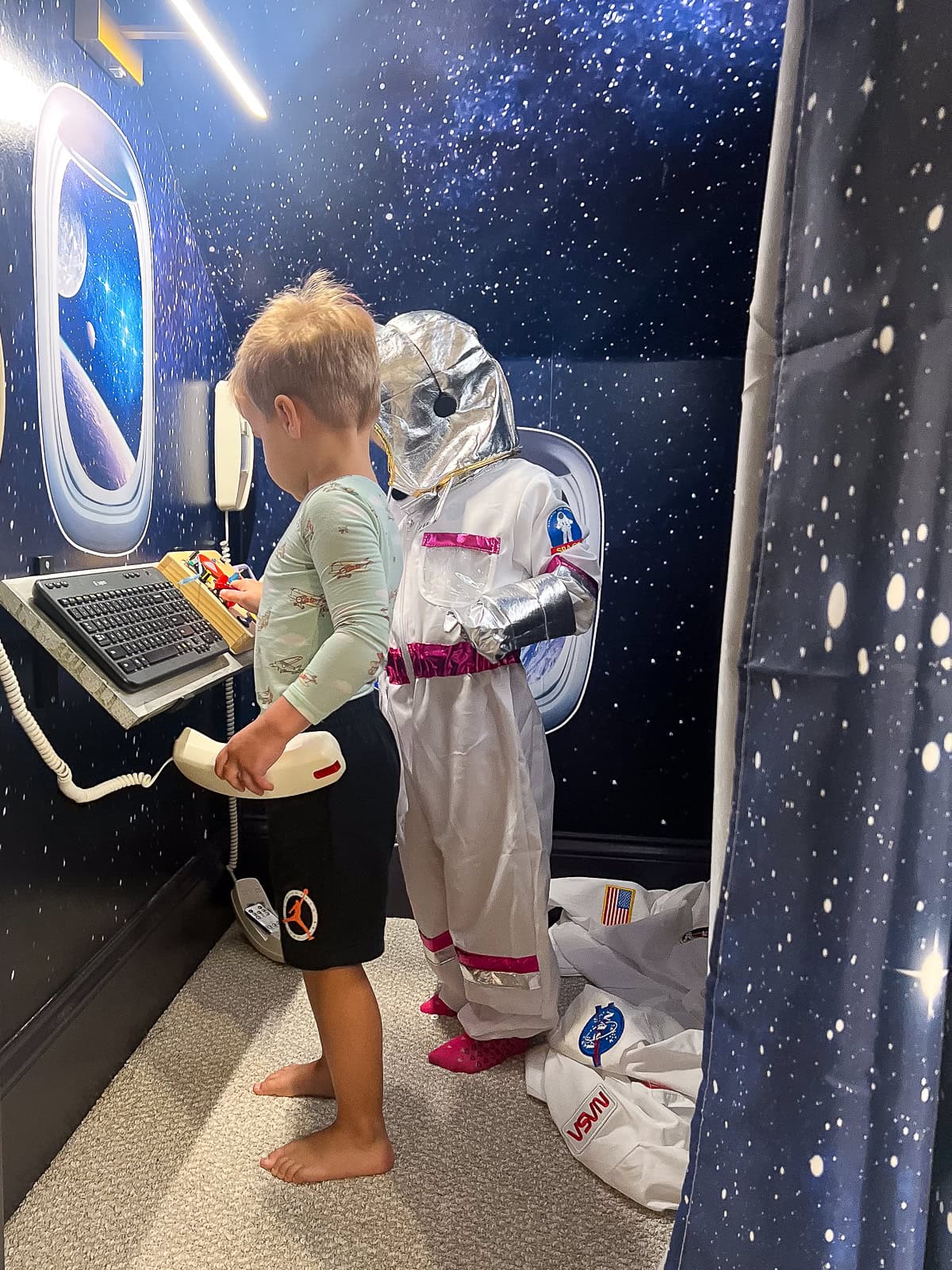 Rory and Ellis playing in their new outer space playroom