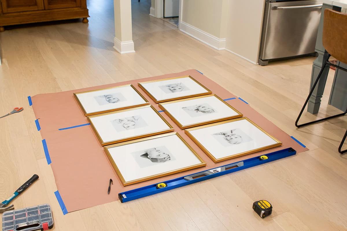Lay out rosin paper on your floor when hanging a gallery wall