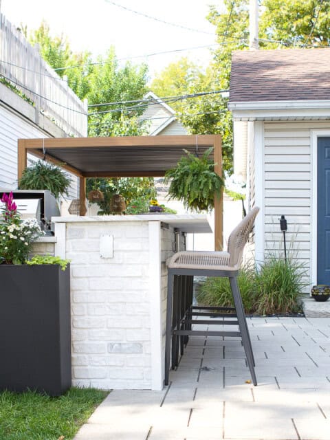 Does an outdoor kitchen improve your home value? Let's dive into the details